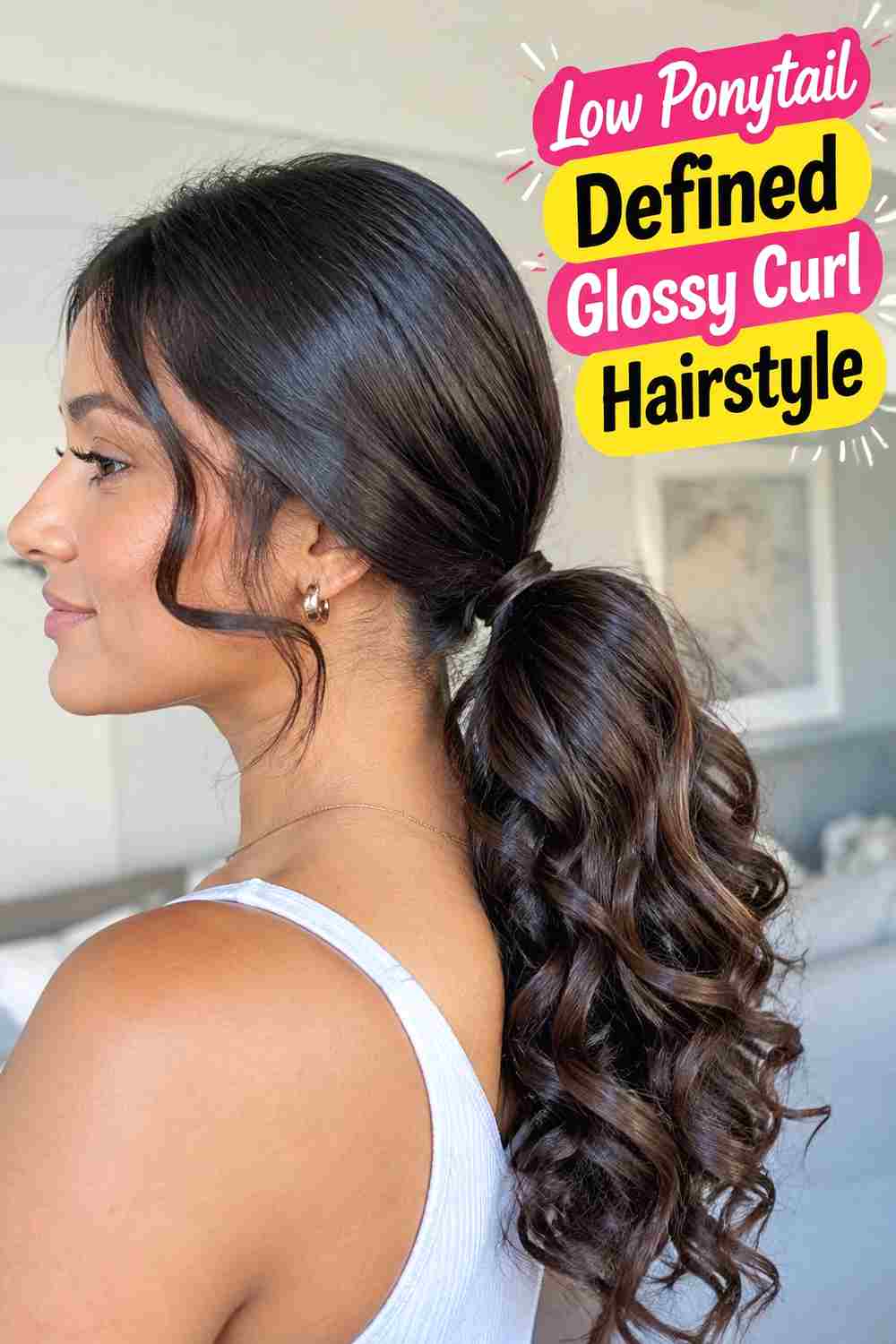 12. Low Ponytail Defined Glossy Curl Hairstyle