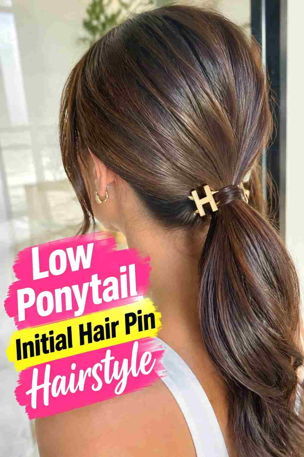 16. Low Ponytail Initial Hair Pin Hairstyle