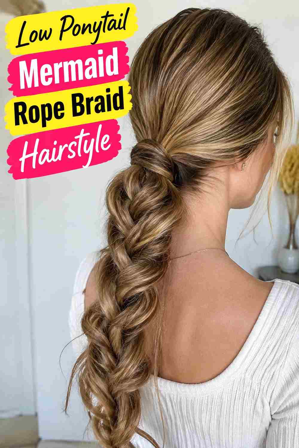 9. Low Ponytail Mermaid Rope Braid Hairstyle
