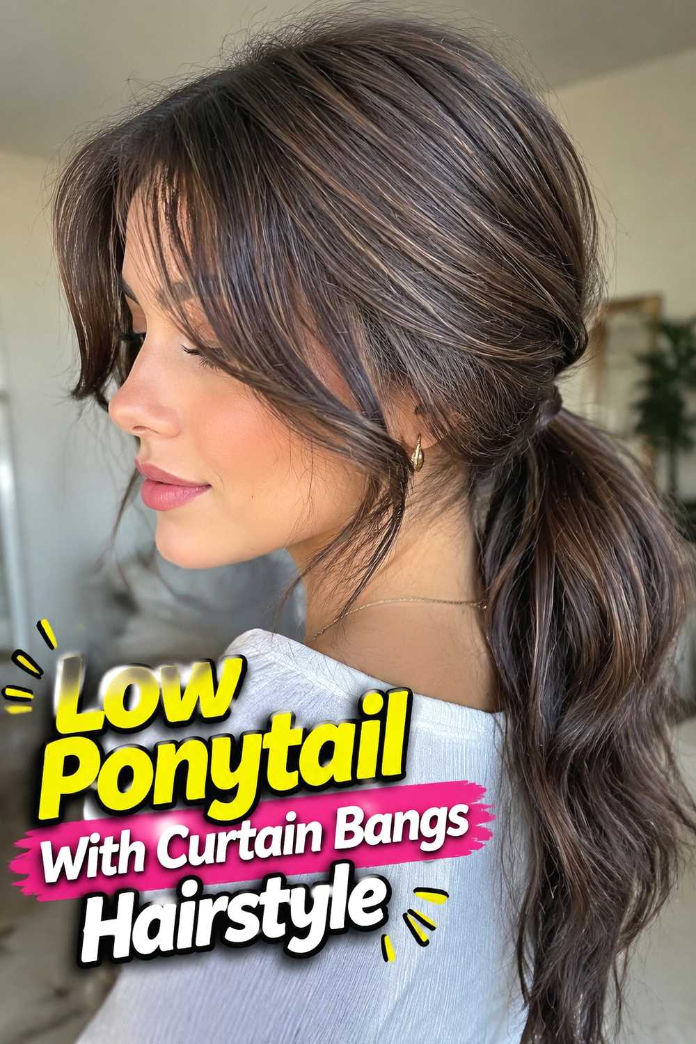 6. Low Ponytail With Curtain Bangs Hairstyle