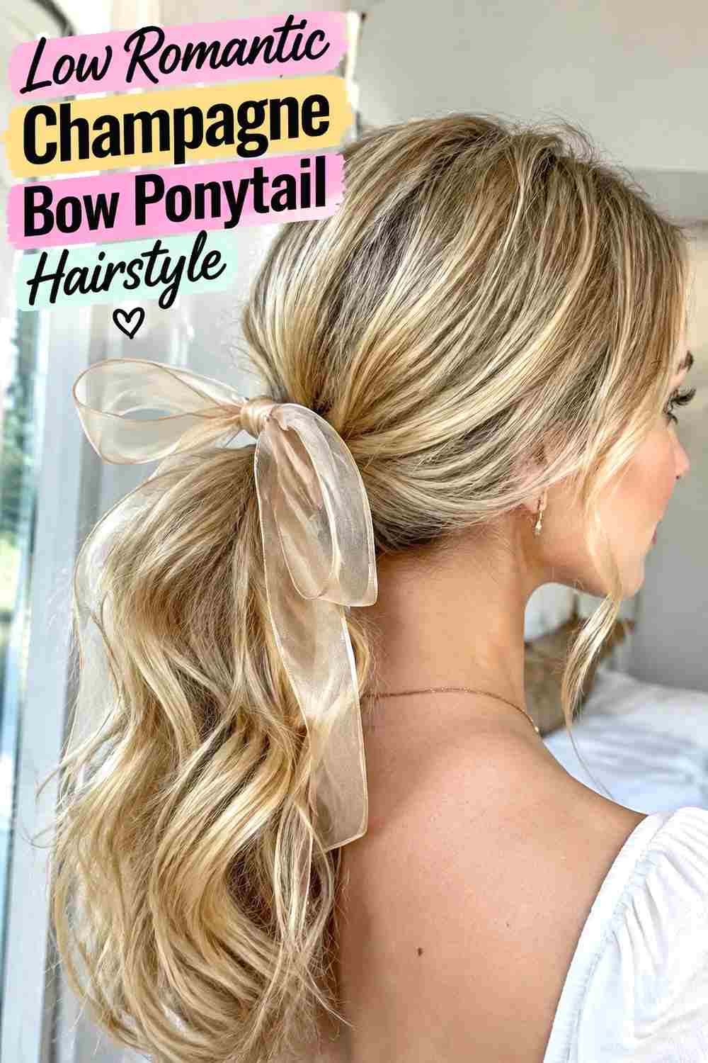 3. Low Romantic Champagne Bow Ponytail Hairstyle