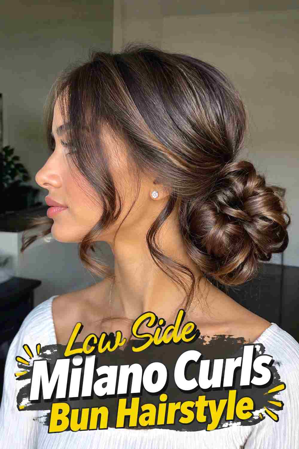 18. Low Side Milano Curls Bun Hairstyle