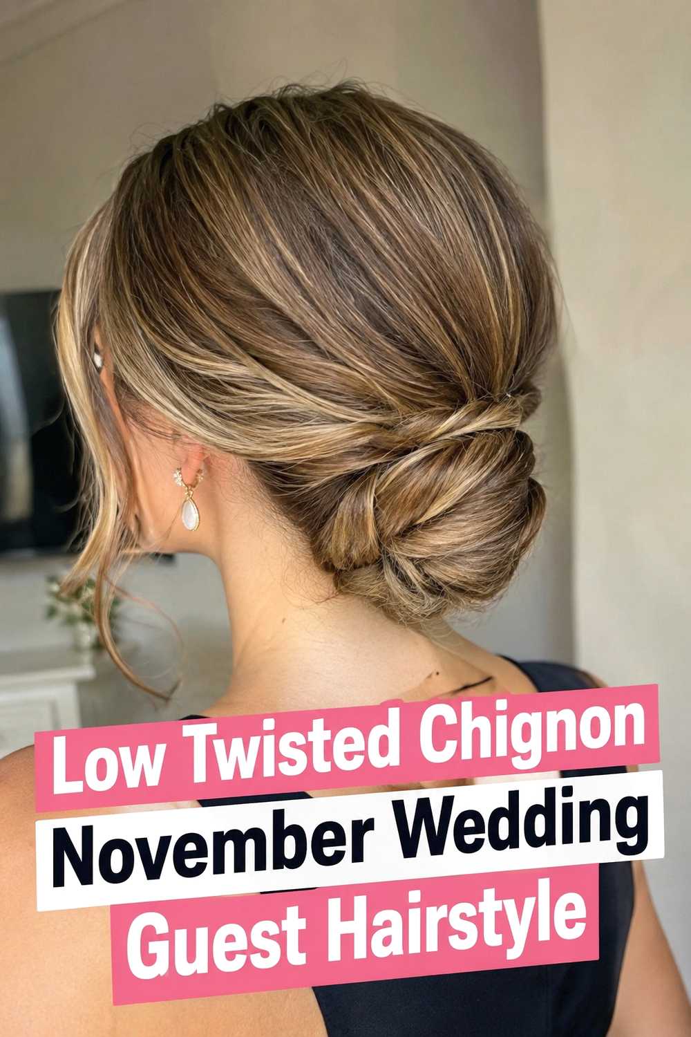 2. Low Twisted Chignon November Wedding Guest Hairstyle