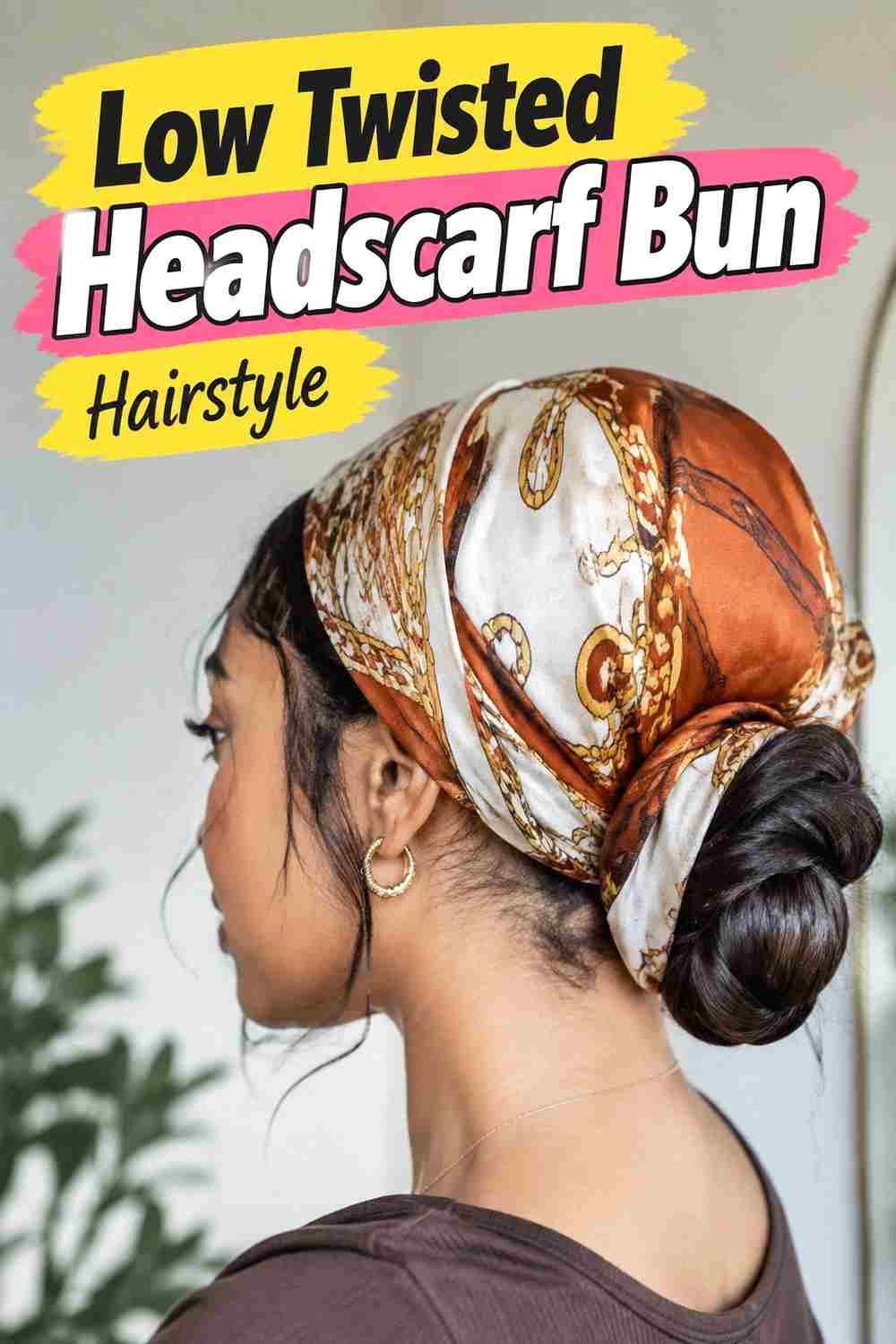 2. Low Twisted Headscarf Bun Hairstyle