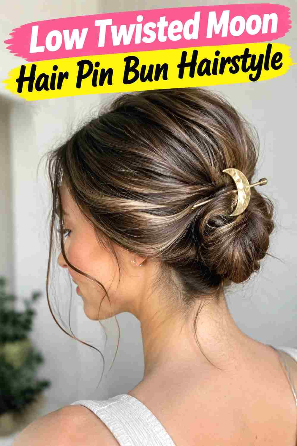 2. Low Twisted Moon Hair Pin Bun Hairstyle