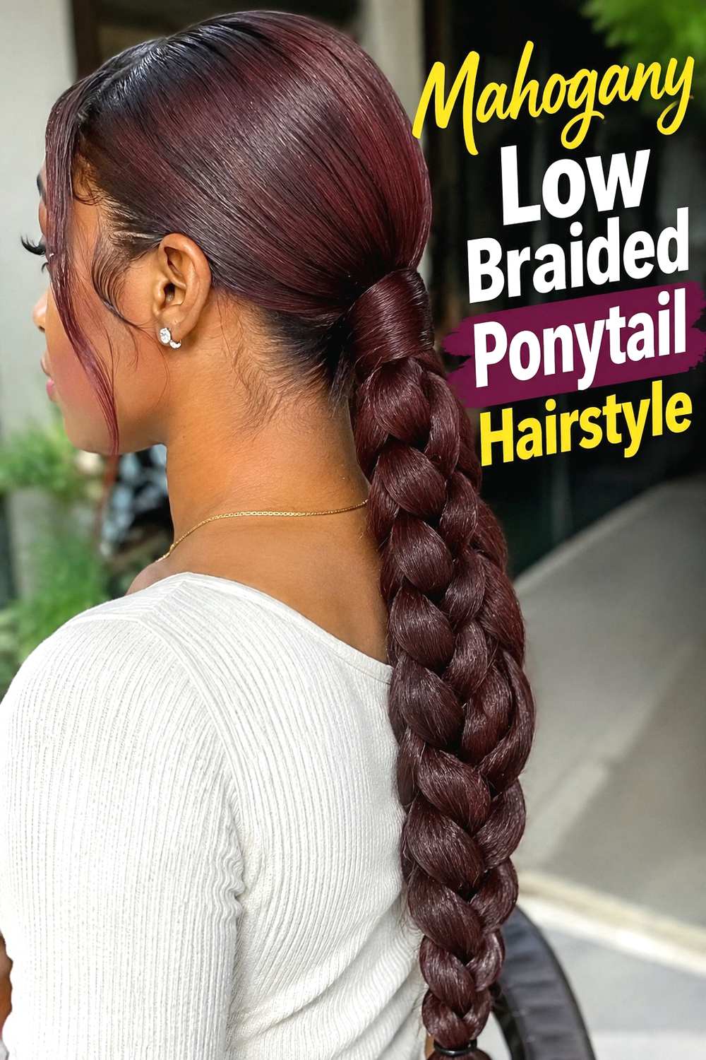 13. Mahogany Low Braided Ponytail Hairstyle
