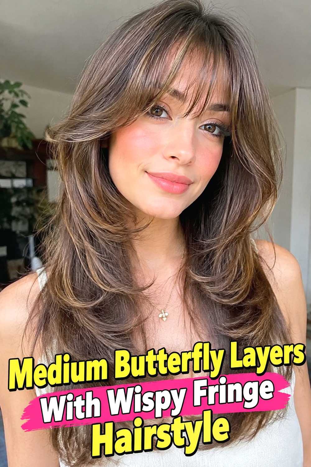 3. Medium Butterfly Layers With Wispy Fringe Hairstyle