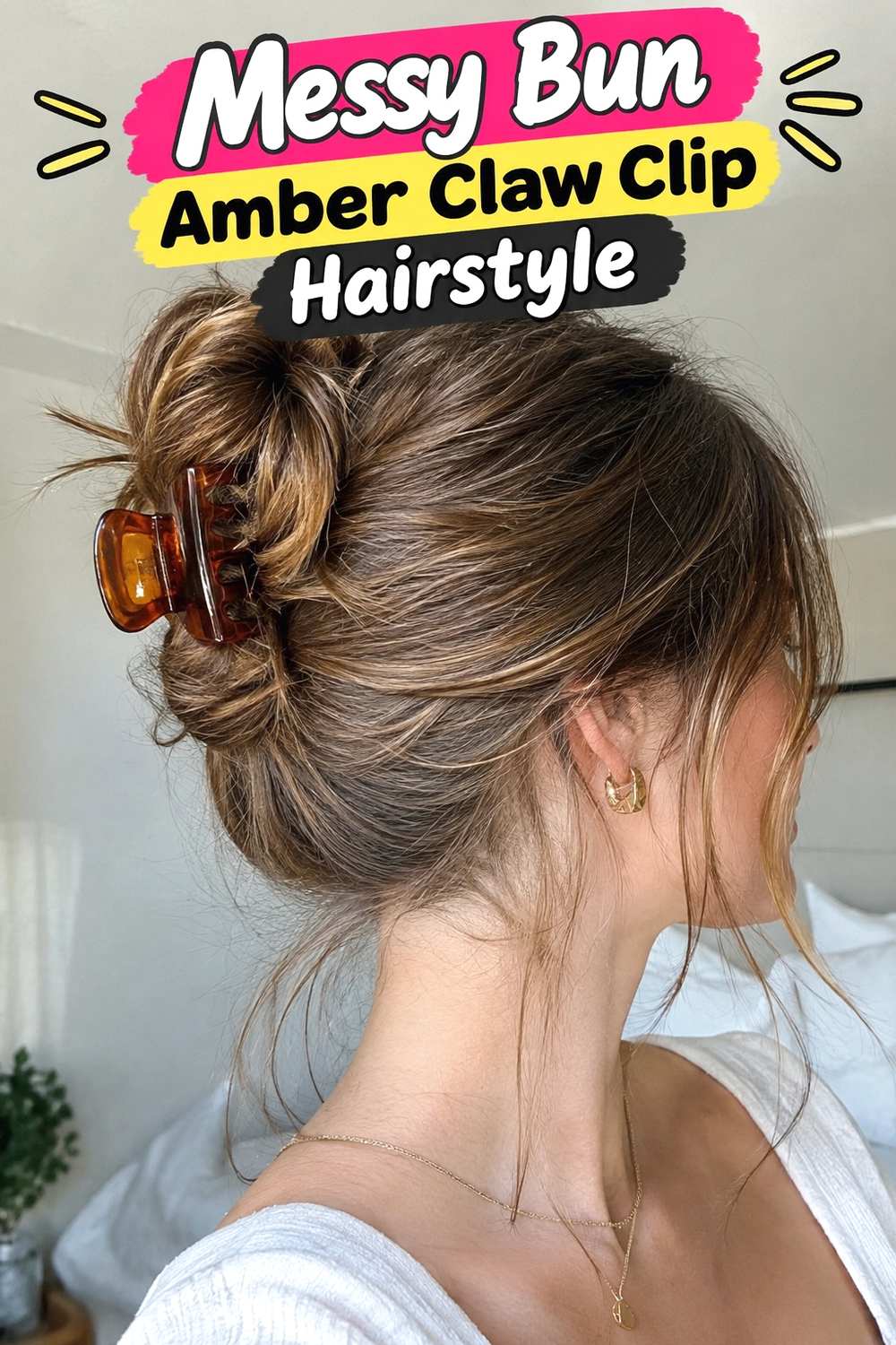 4. Messy Bun Amber Claw Clip Hairstyle