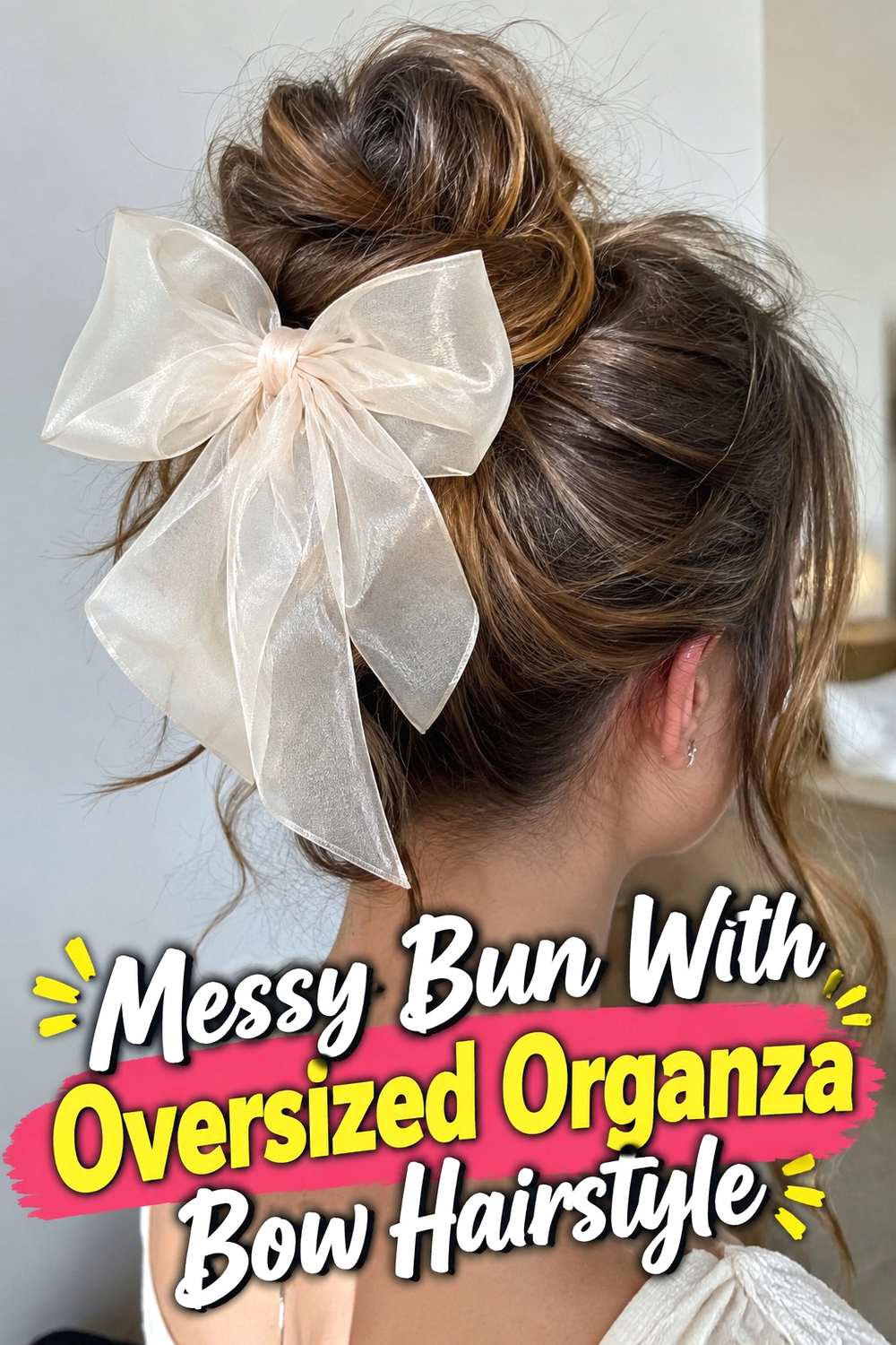 8. Messy Bun With Oversized Organza Bow Hairstyle