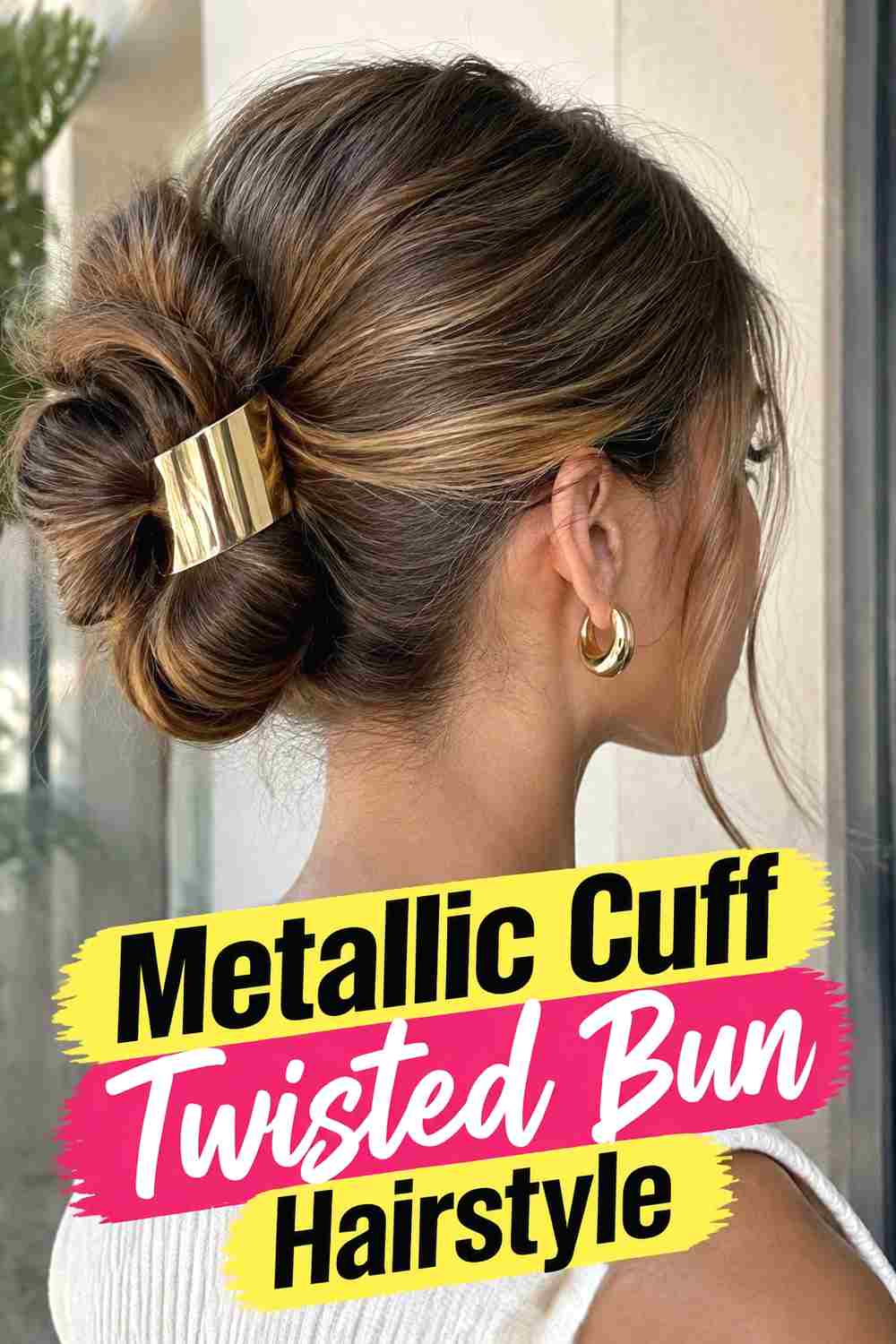 9. Metallic Cuff Twisted Bun Hairstyle