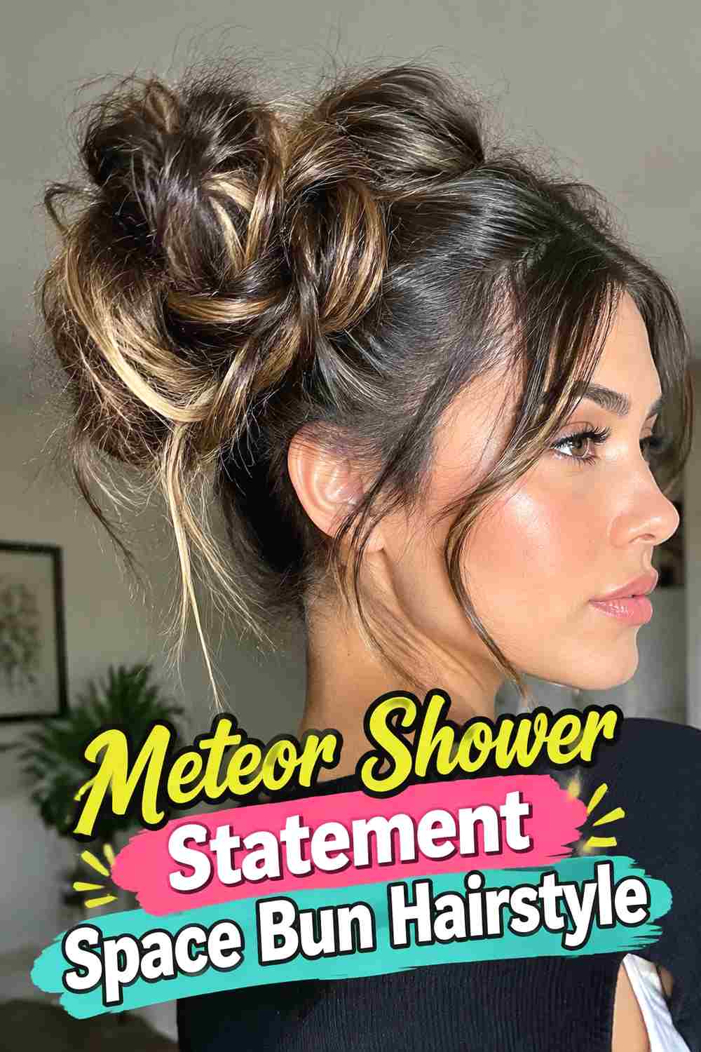 17. Meteor Shower Statement Space Bun Hairstyle