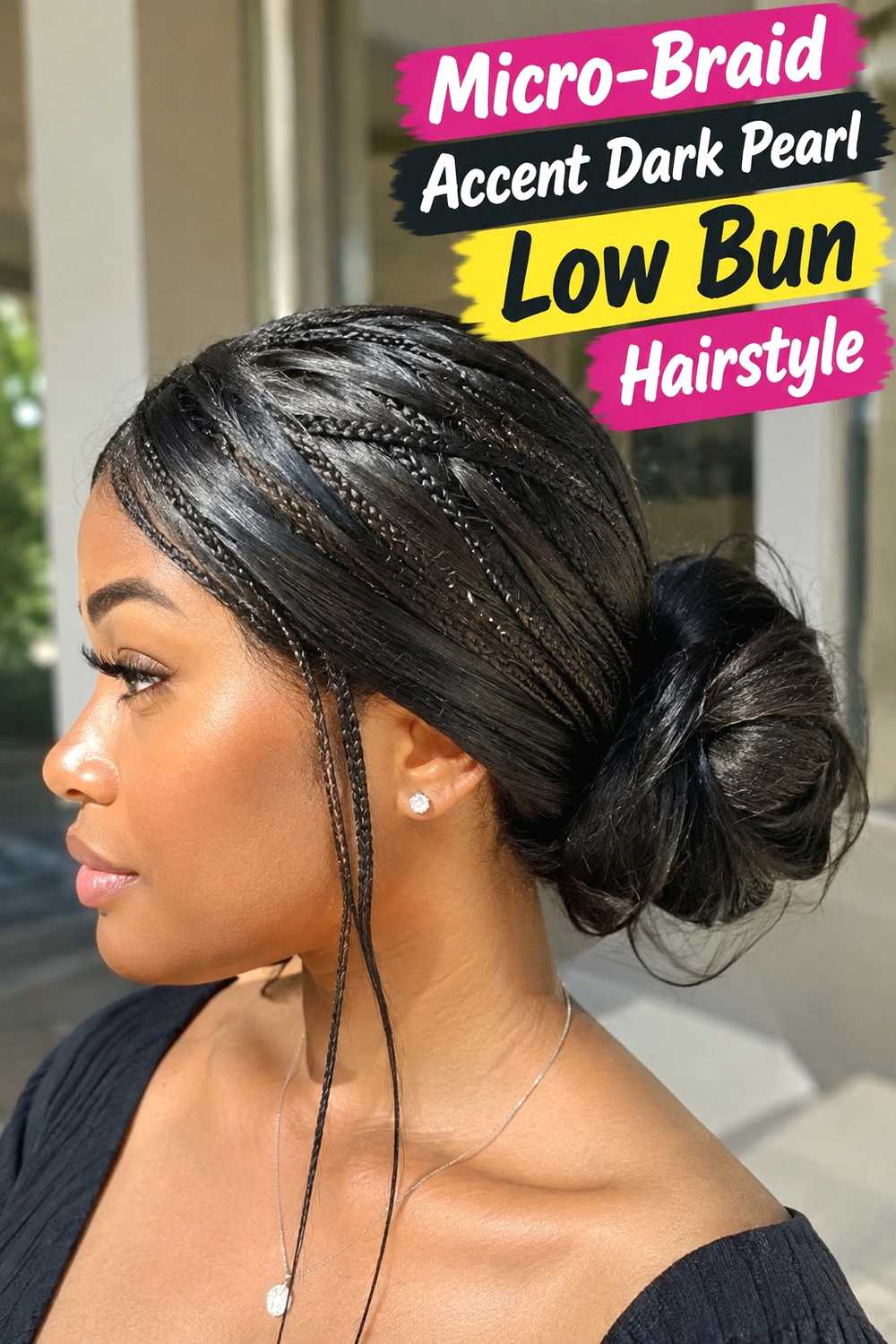 16. Micro Braid Accent Dark Pearl Low Bun Hairstyle