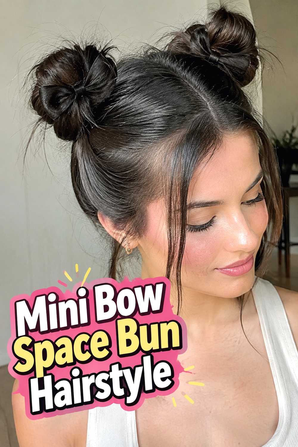 6. Mini Bow Space Bun Hairstyle