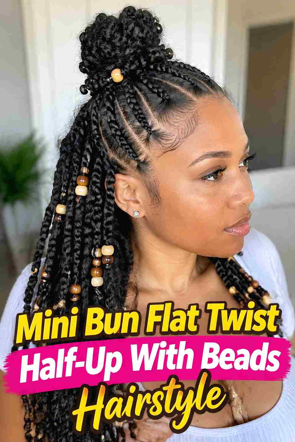 13. Mini Bun Flat Twist Half Up With Beads Hairstyle