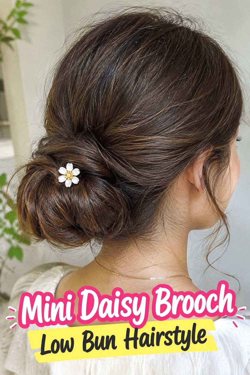 12. Mini Daisy Brooch Low Bun Hairstyle