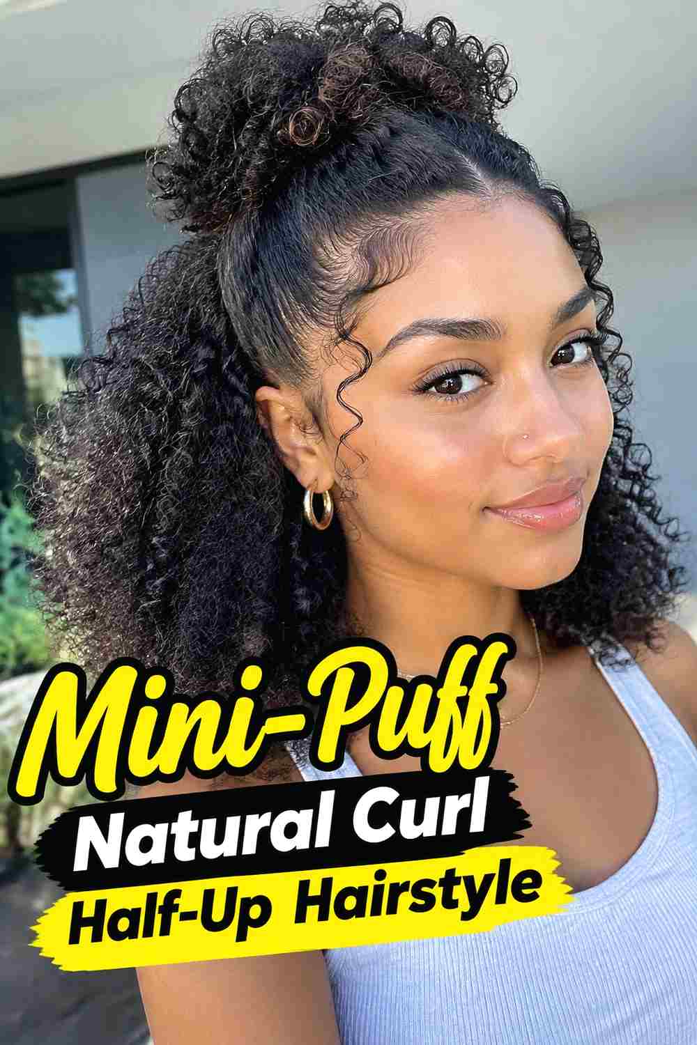 16. Mini Puff Natural Curl Half Up Hairstyle