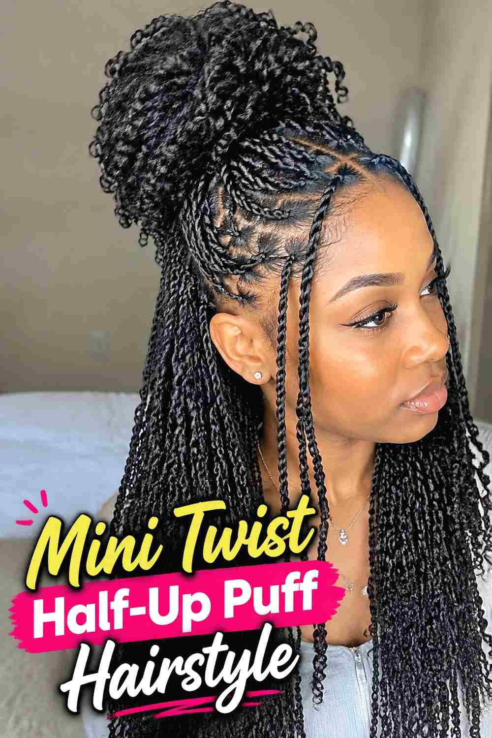 18. Mini Twist Half Up Puff Hairstyle