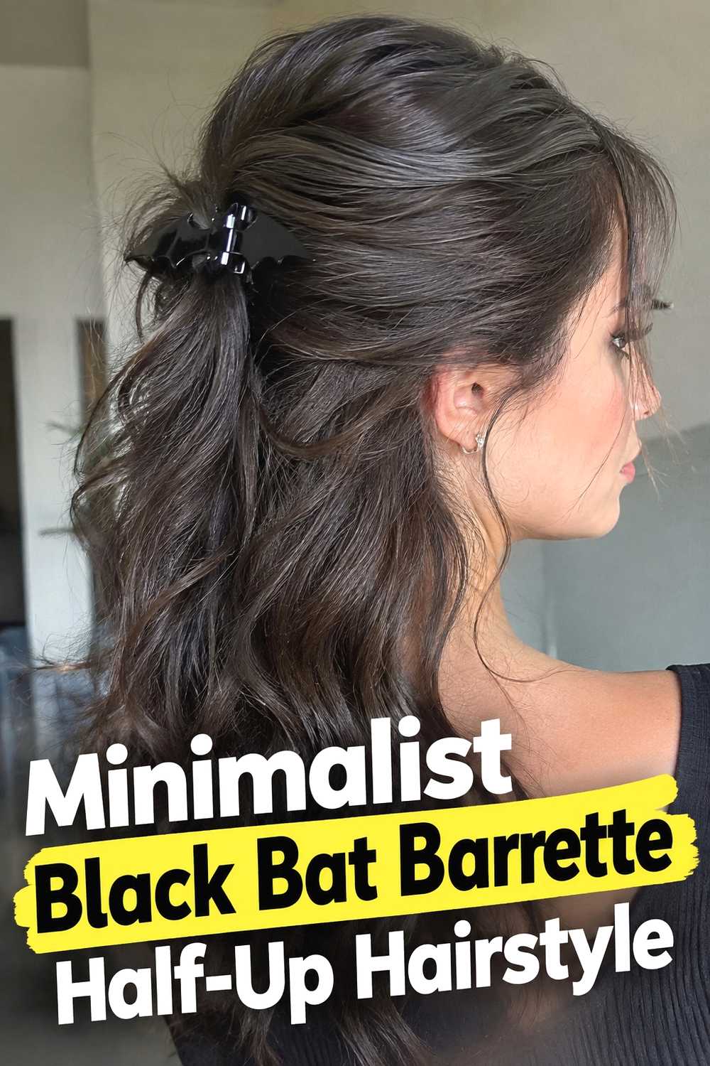 15. Minimalist Black Bat Barrette Half Up Hairstyle