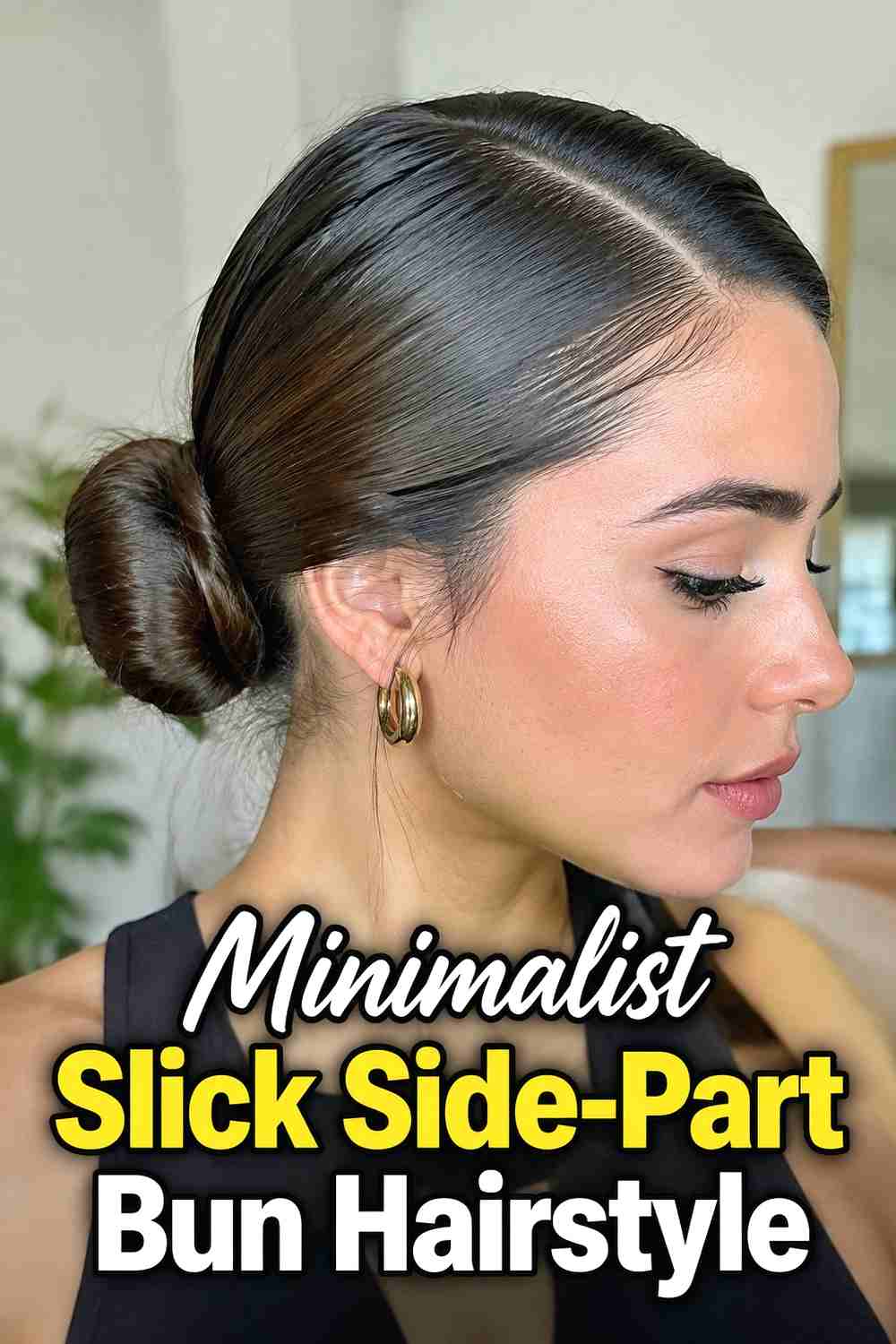 11. Minimalist Slick Side Part Bun Hairstyle