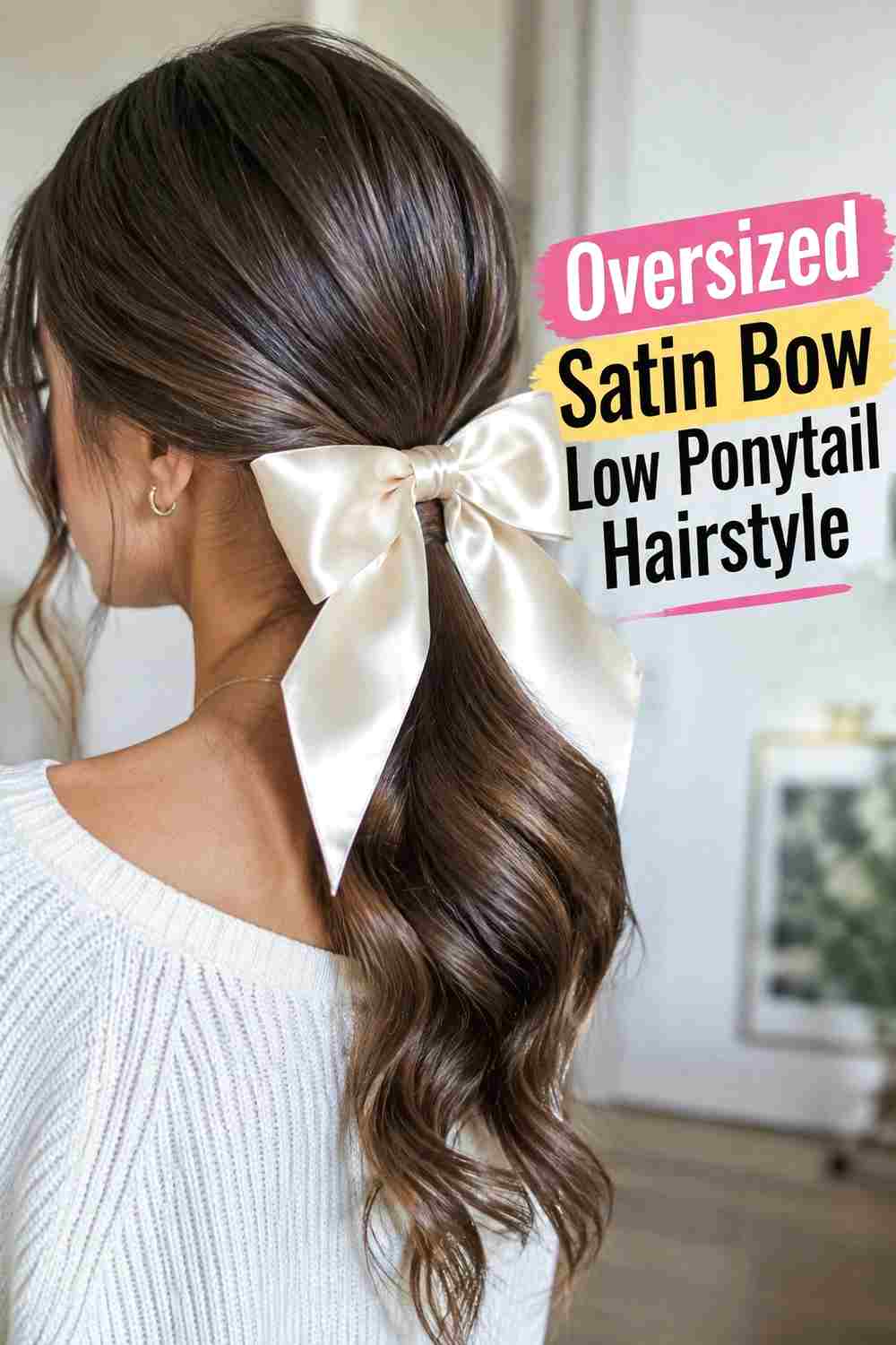 9. Oversized Satin Bow Low Ponytail Hairstyle