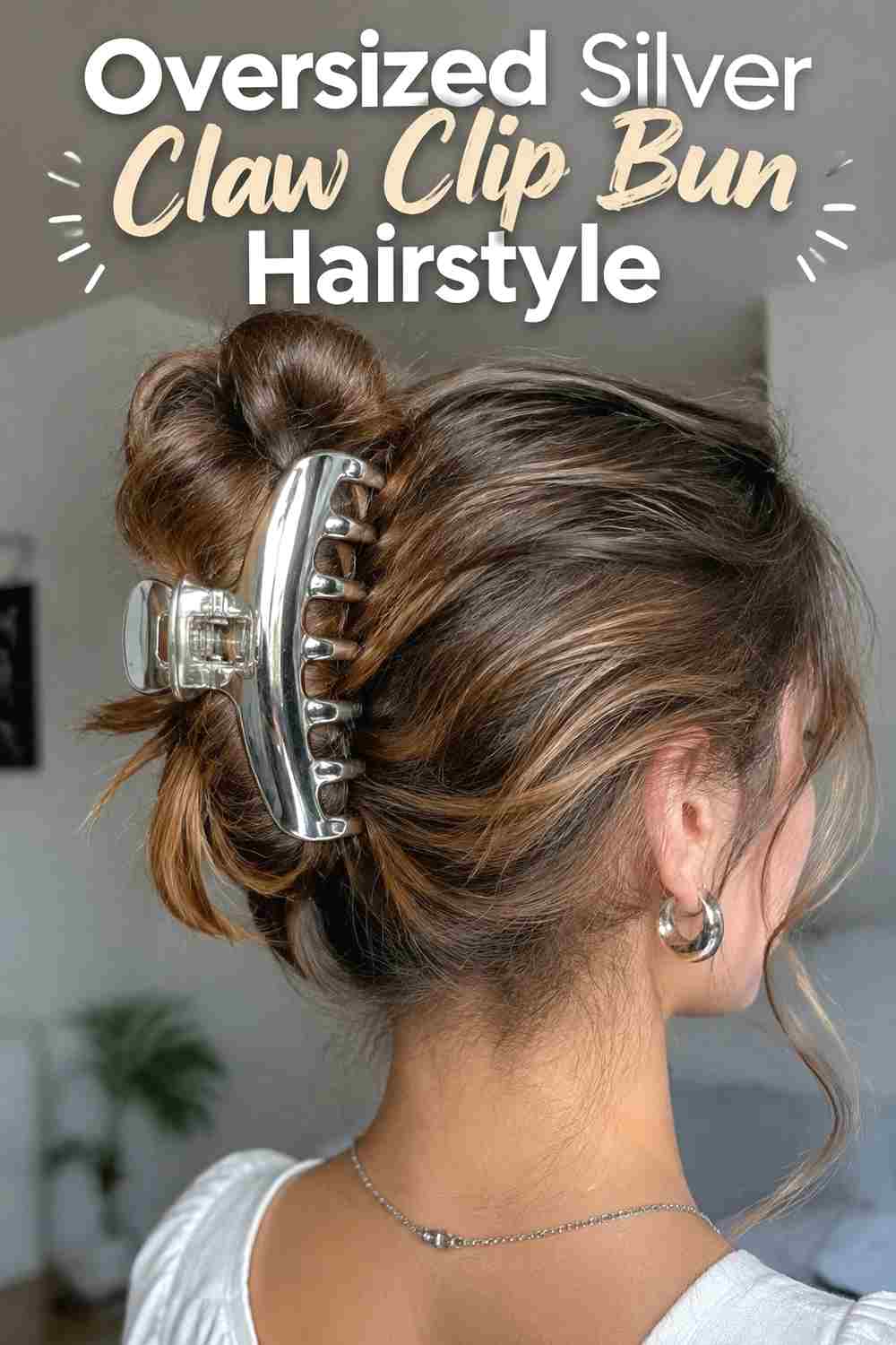 11. Oversized Silver Claw Clip Bun Hairstyle