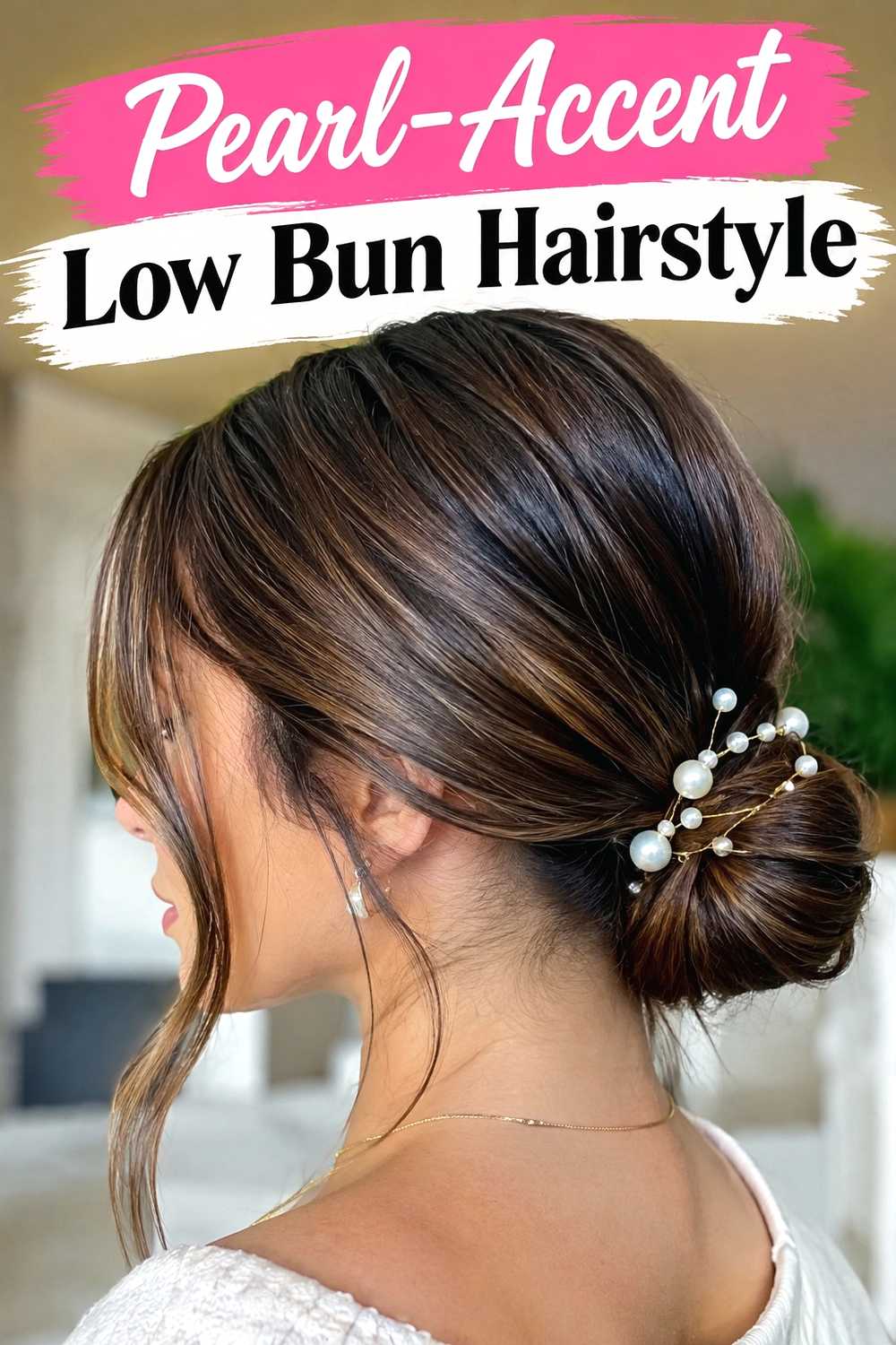 14. Pearl Accent Low Bun Hairstyle