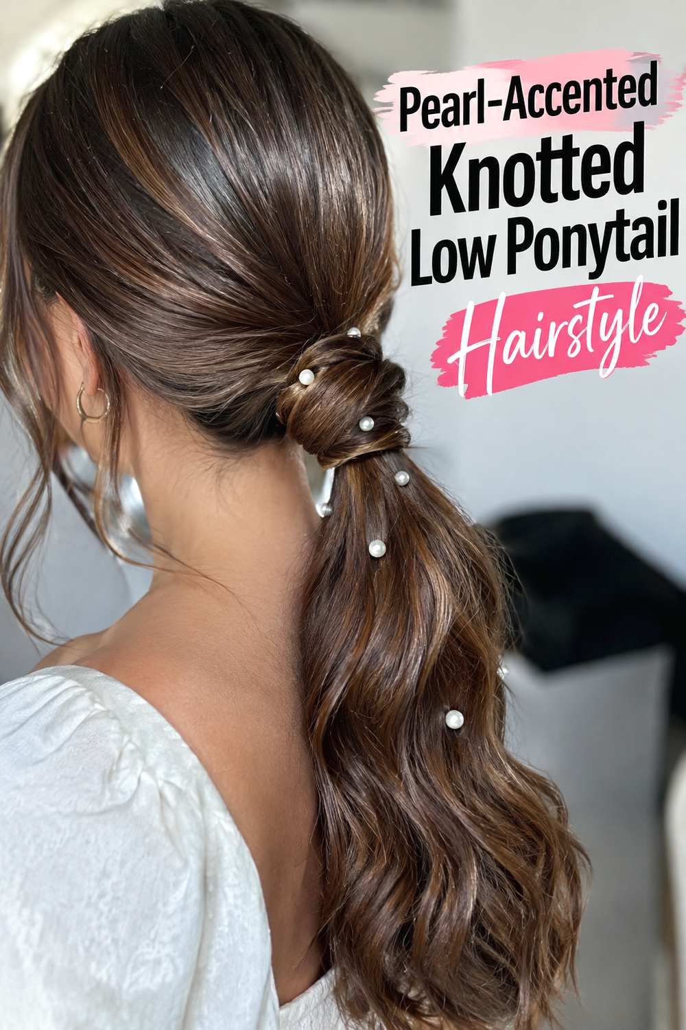Pearl-Accented Knotted Low Ponytail Hairstyle