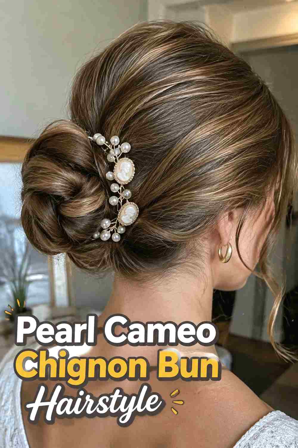 2. Pearl Cameo Chignon Bun Hairstyle