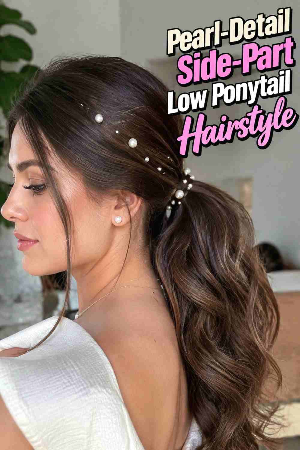 13. Pearl Detail Side Part Low Ponytail Hairstyle