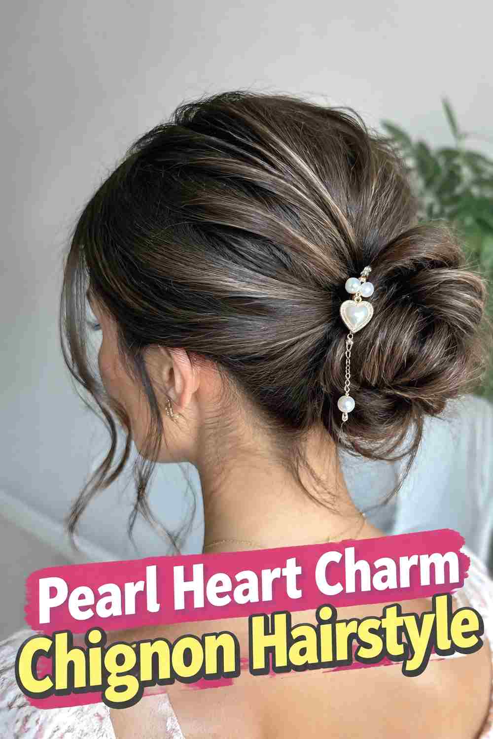 2. Pearl Heart Charm Chignon Hairstyle