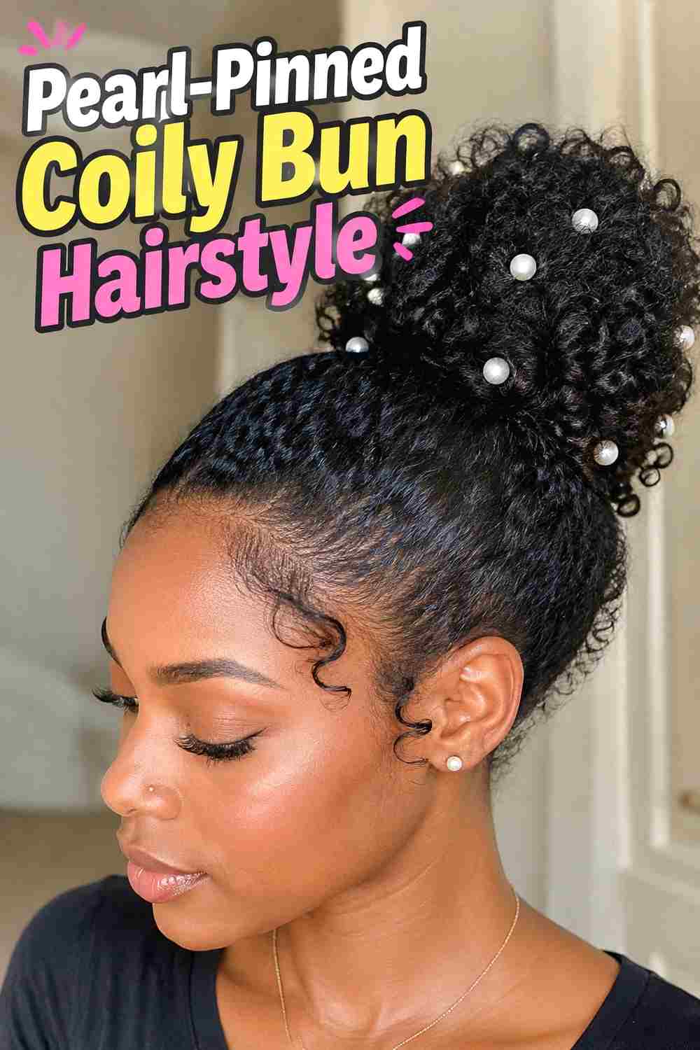 2. Pearl Pinned Coily Bun Hairstyle