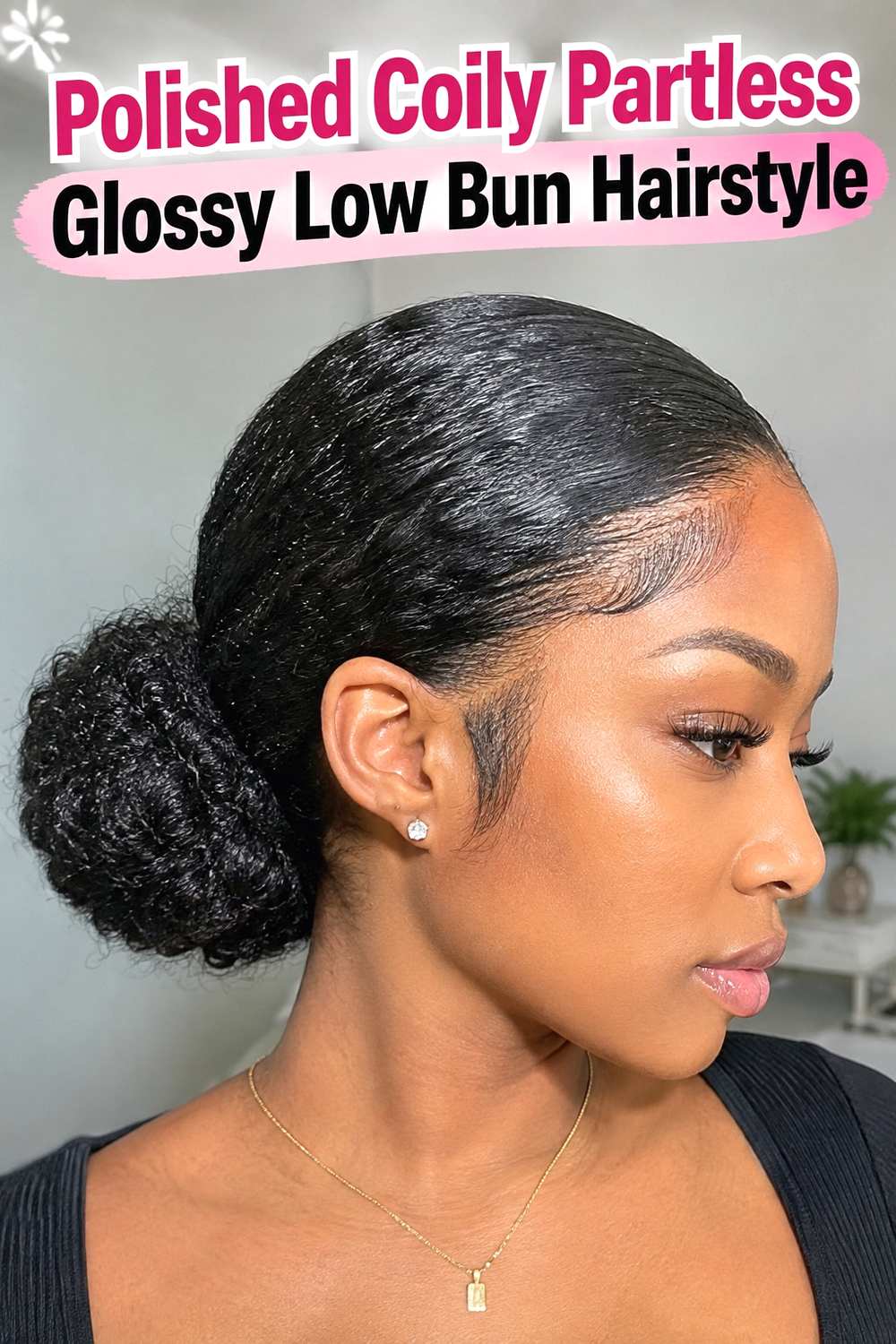 15. Polished Coily Partless Glossy Low Bun Hairstyle