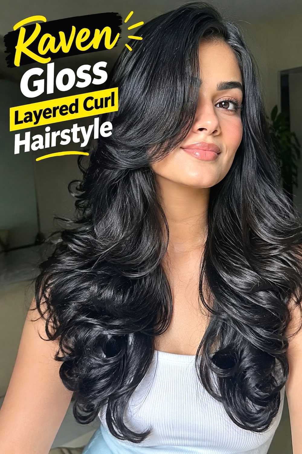 15. Raven Gloss Layered Curl Hairstyle