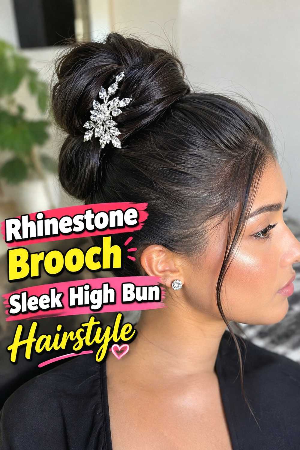 5. Rhinestone Brooch Sleek High Bun Hairstyle