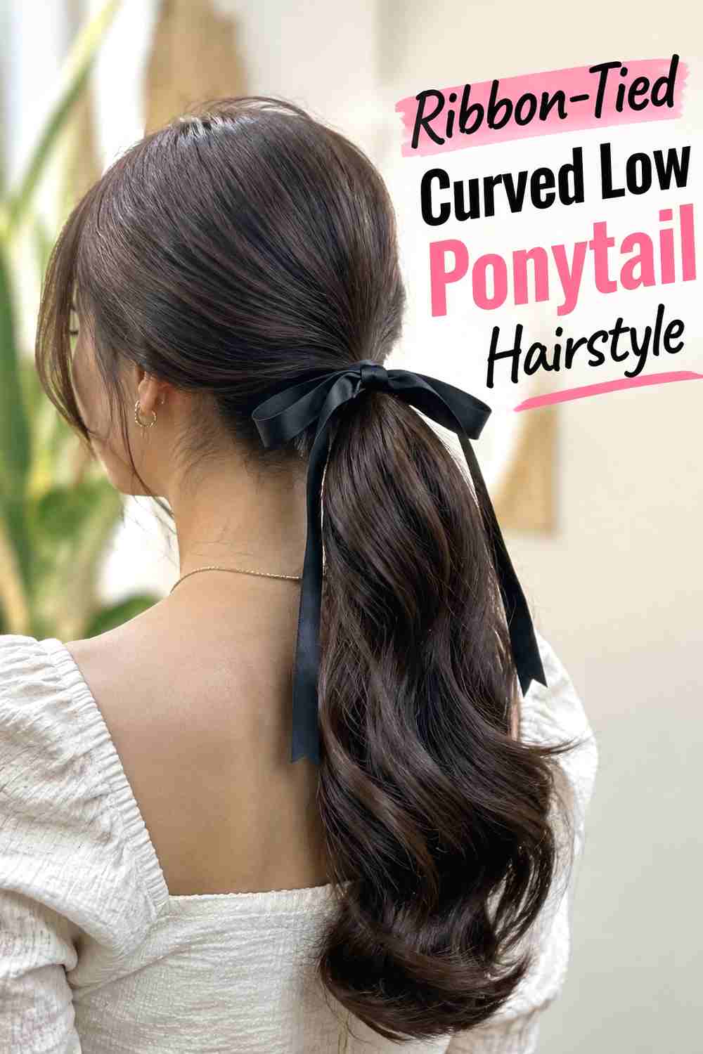 15. Ribbon Tied Curved Low Ponytail Hairstyle