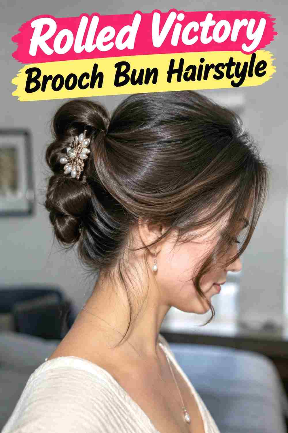 6. Rolled Victory Brooch Bun Hairstyle