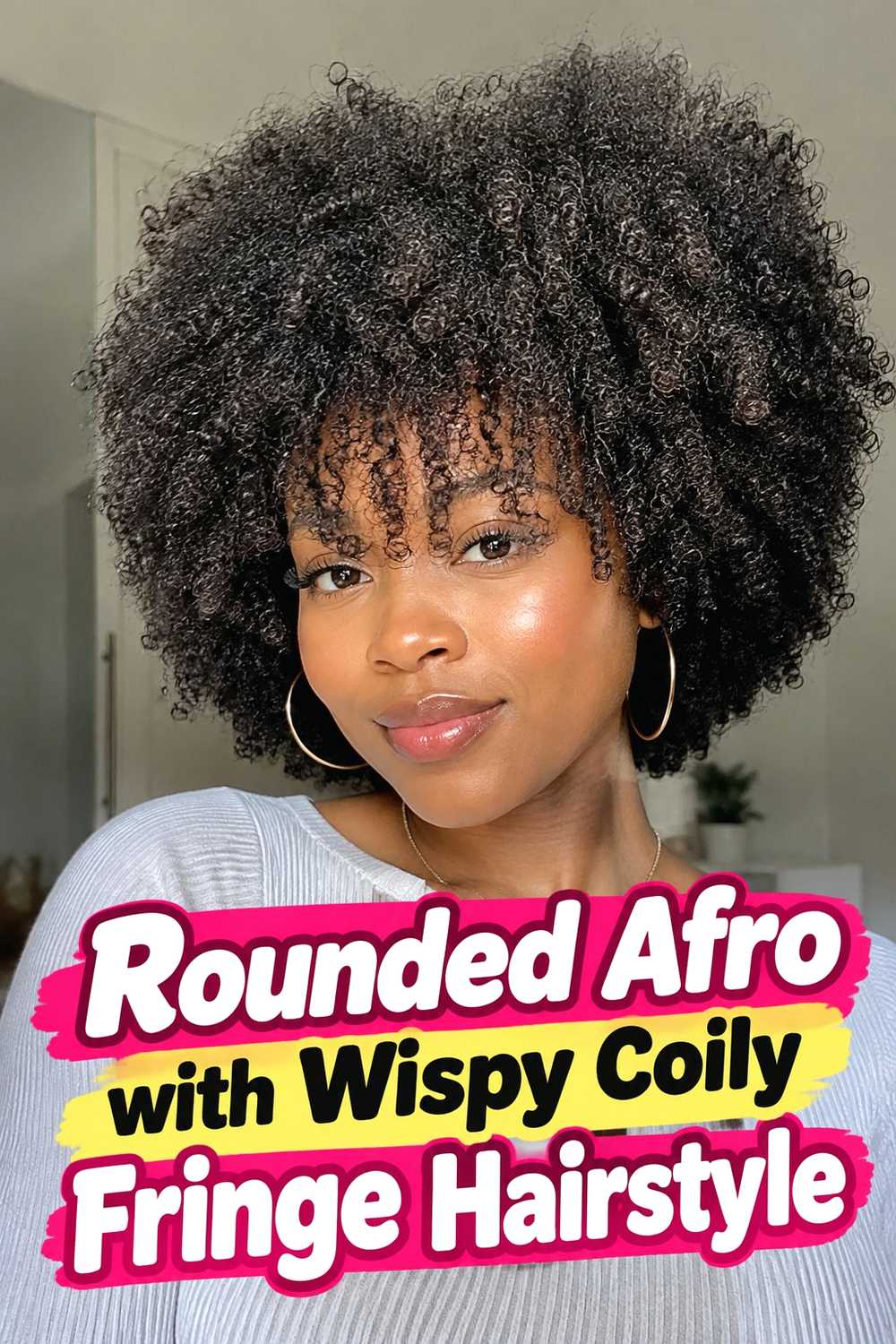 1. Rounded Afro With Wispy Coily Fringe Hairstyle