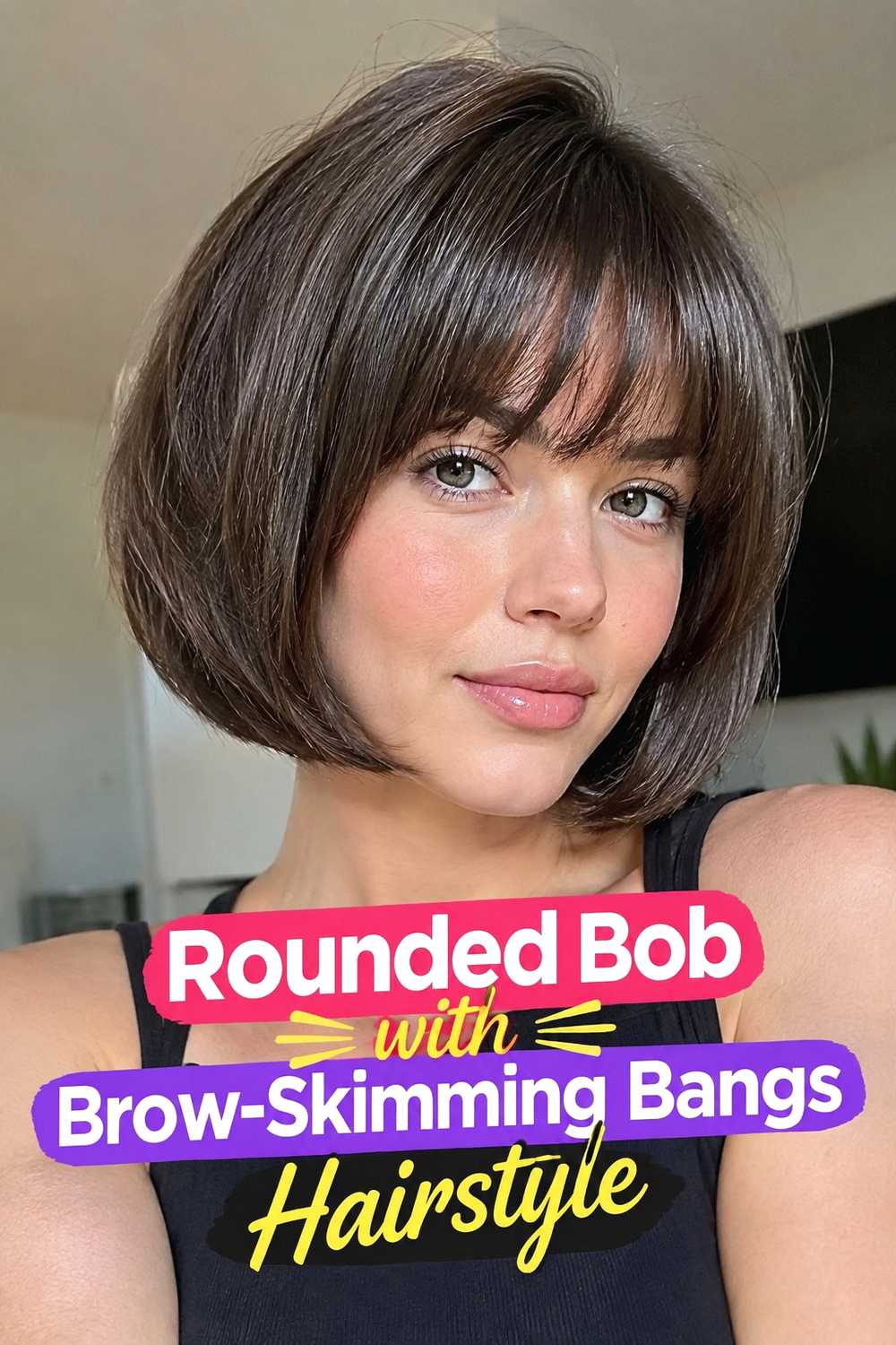 17. Rounded Bob With Brow Skimming Bangs Hairstyle