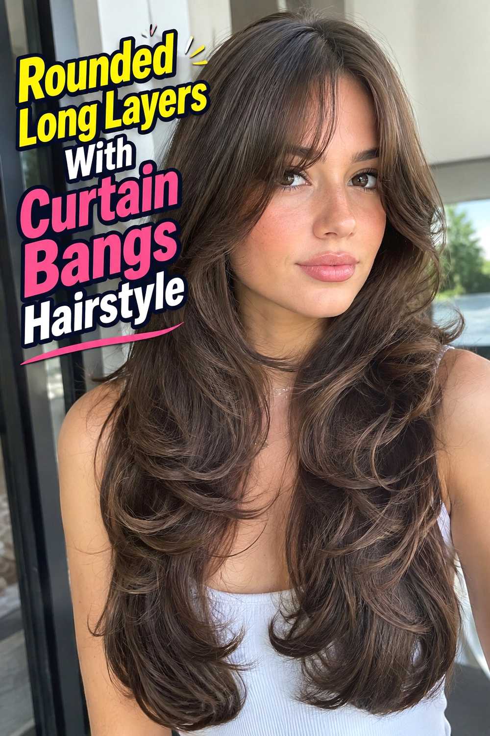 9. Rounded Long Layers With Curtain Bangs Hairstyle