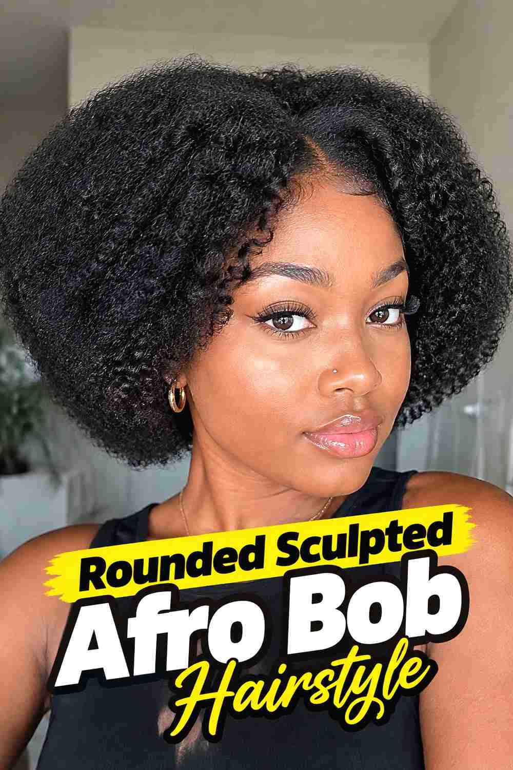 1. Rounded Sculpted Afro Bob Hairstyle