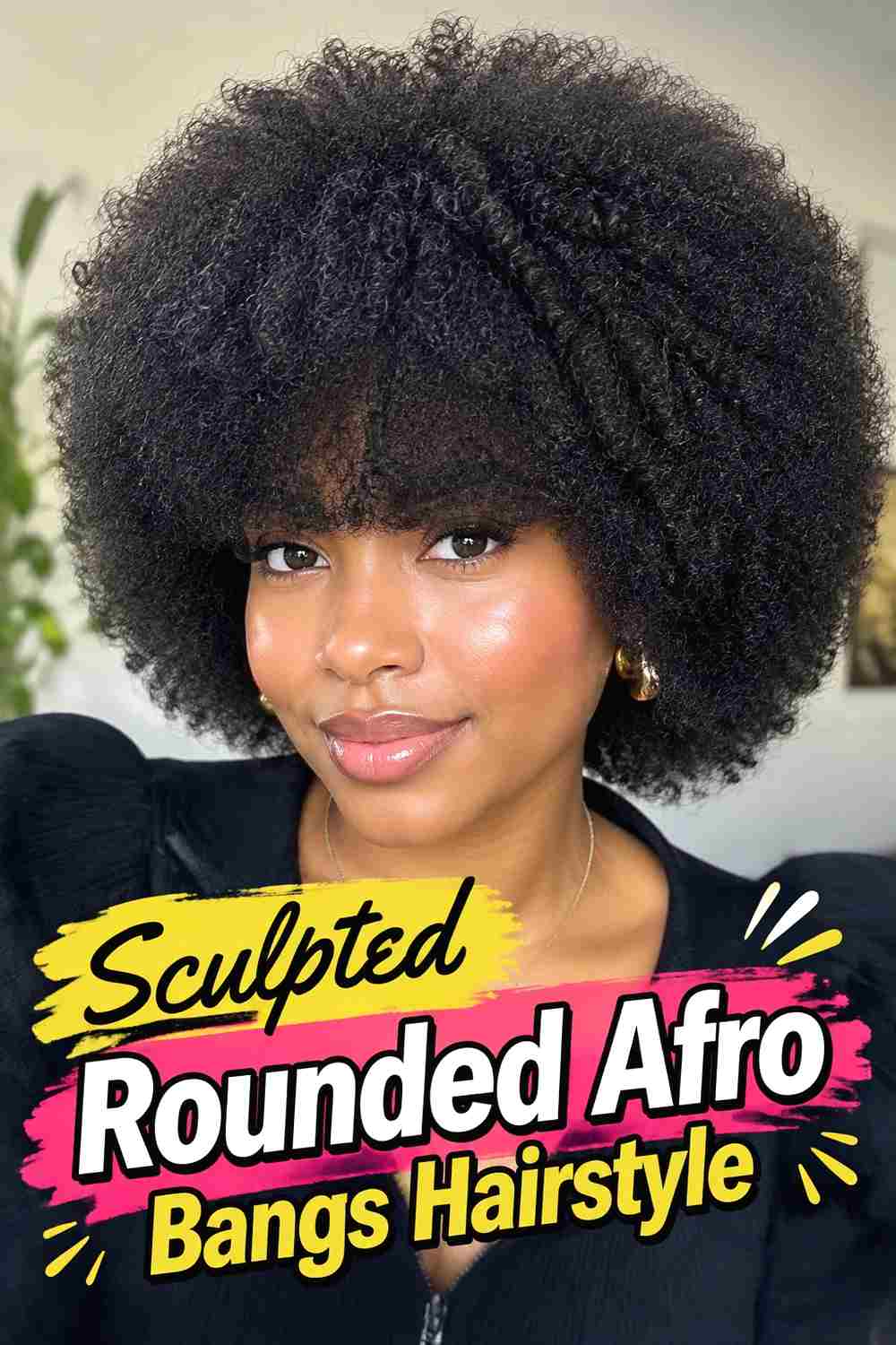 15. Sculpted Rounded Afro Bangs Hairstyle