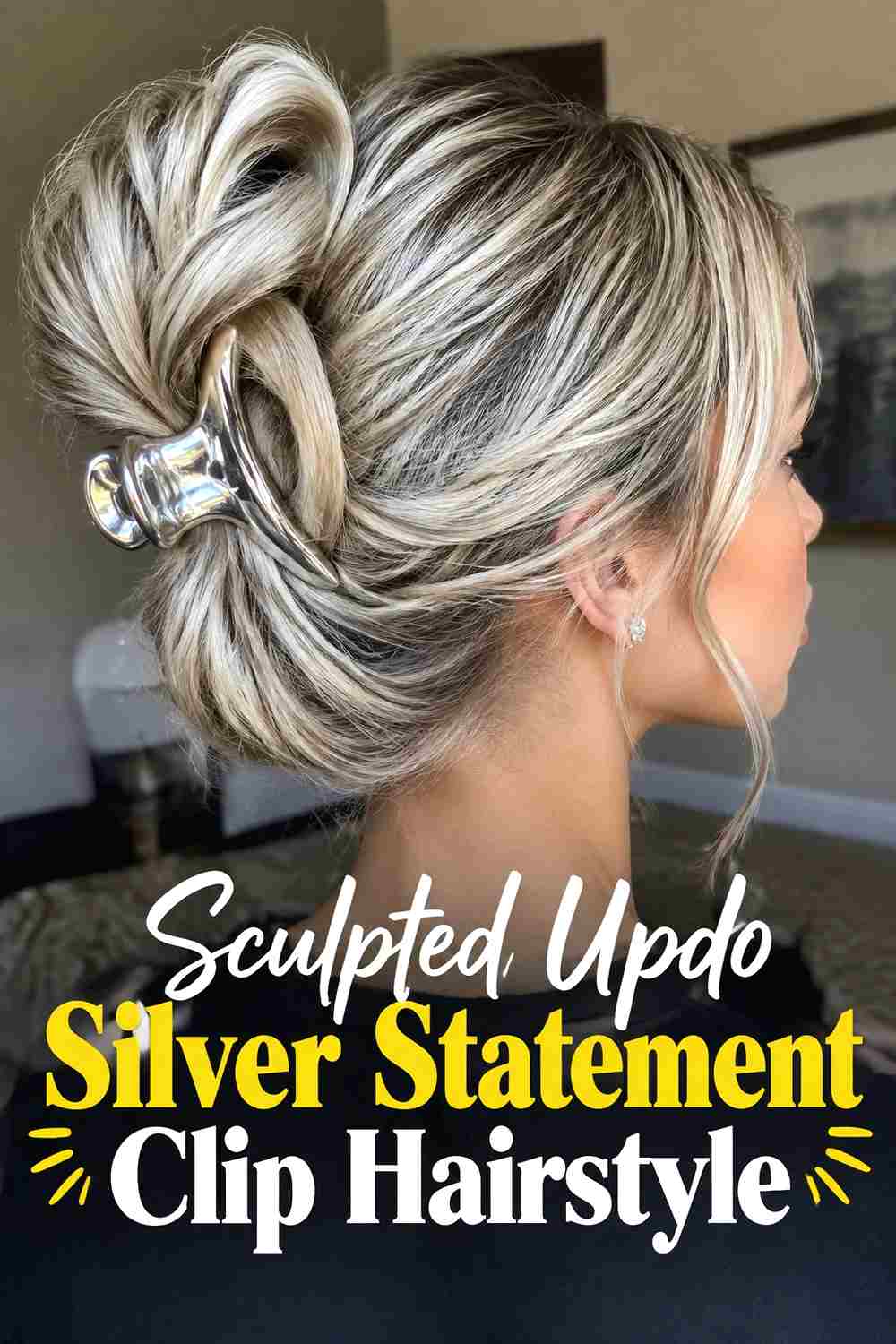 13. Sculpted Updo Silver Statement Clip Hairstyle