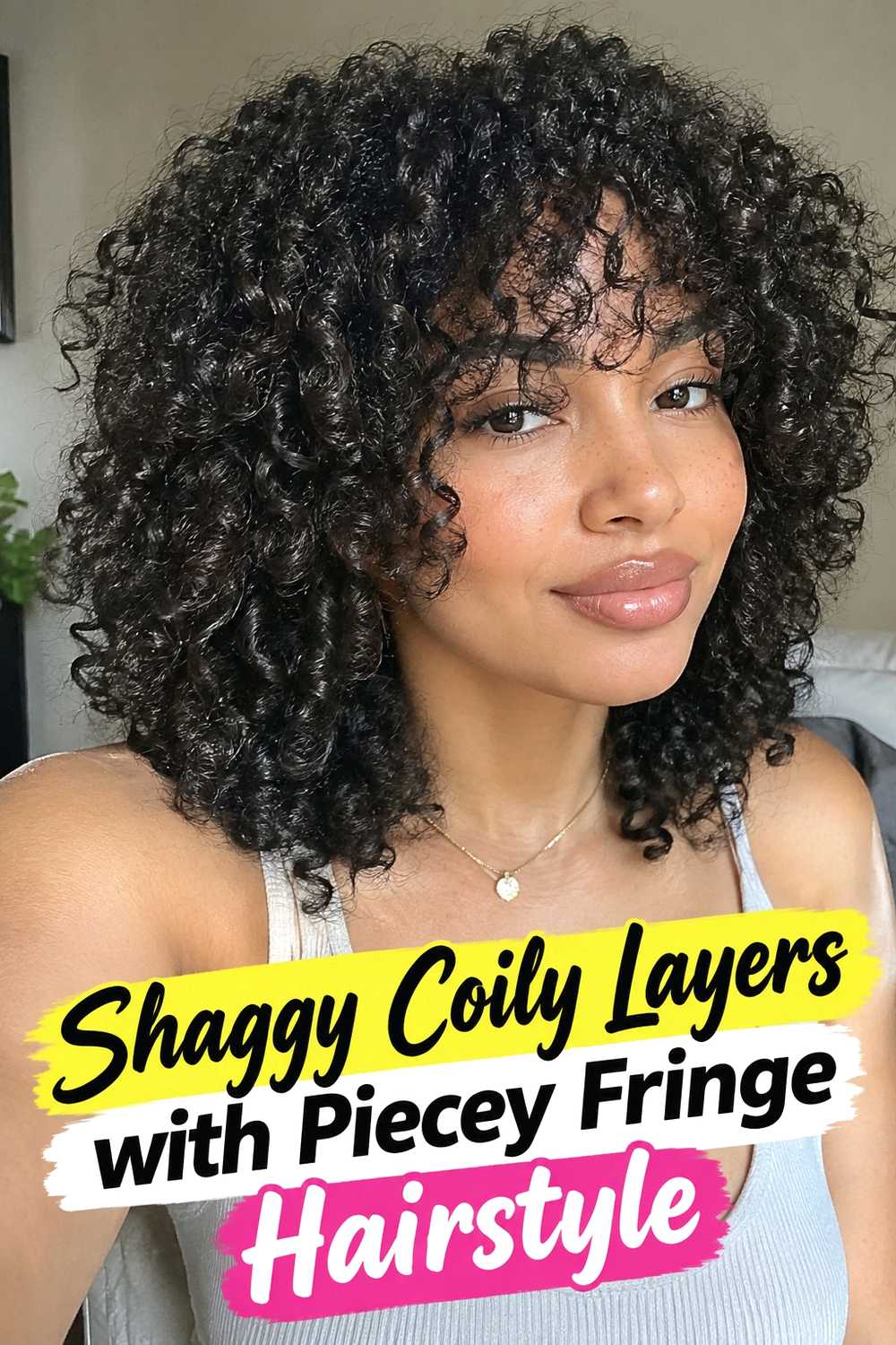 4. Shaggy Coily Layers With Piecey Fringe Hairstyle
