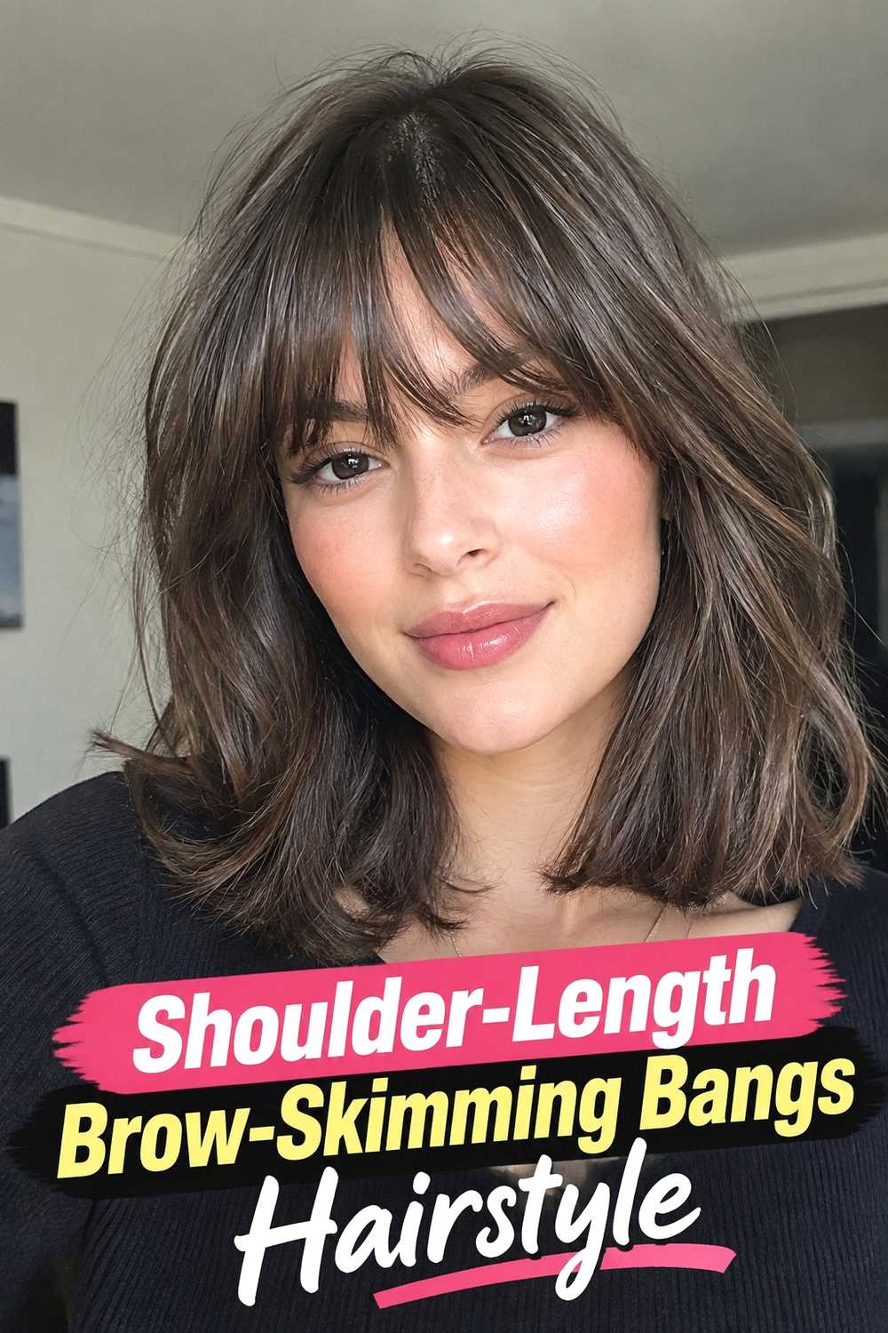 15. Shoulder Length Brow Skimming Bangs Hairstyle