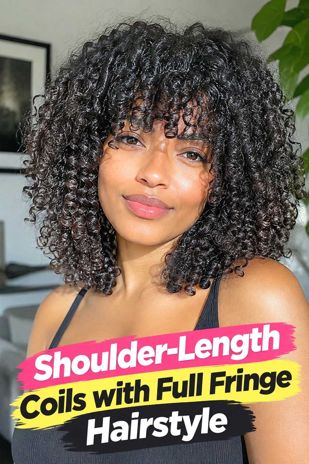 3. Shoulder Length Coils With Full Fringe Hairstyle