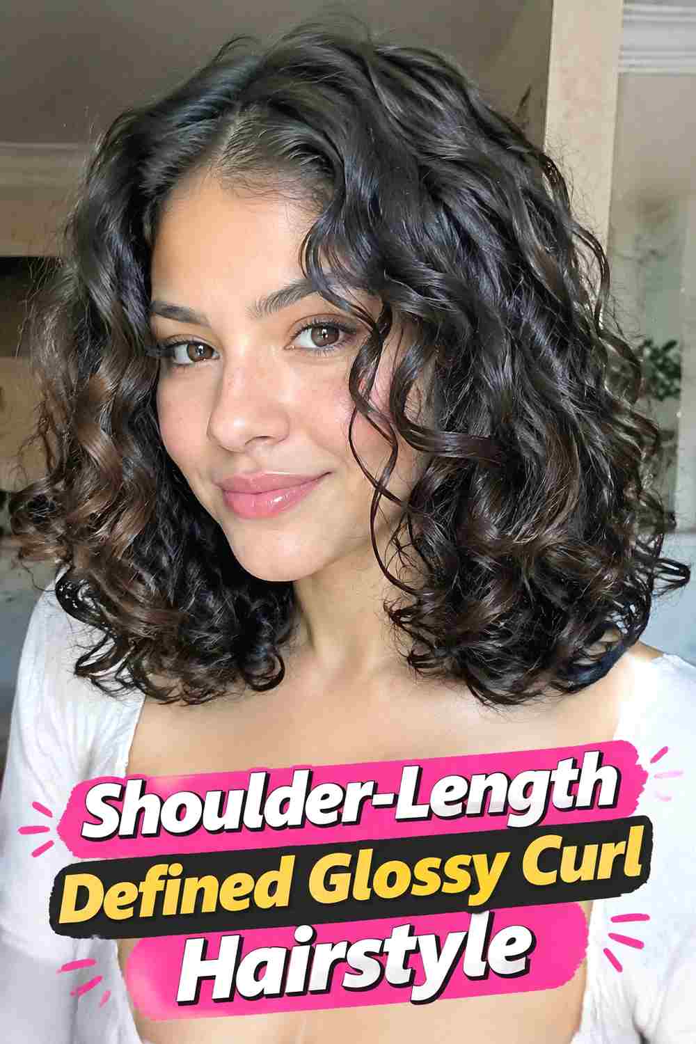 3. Shoulder Length Defined Glossy Curl Hairstyle