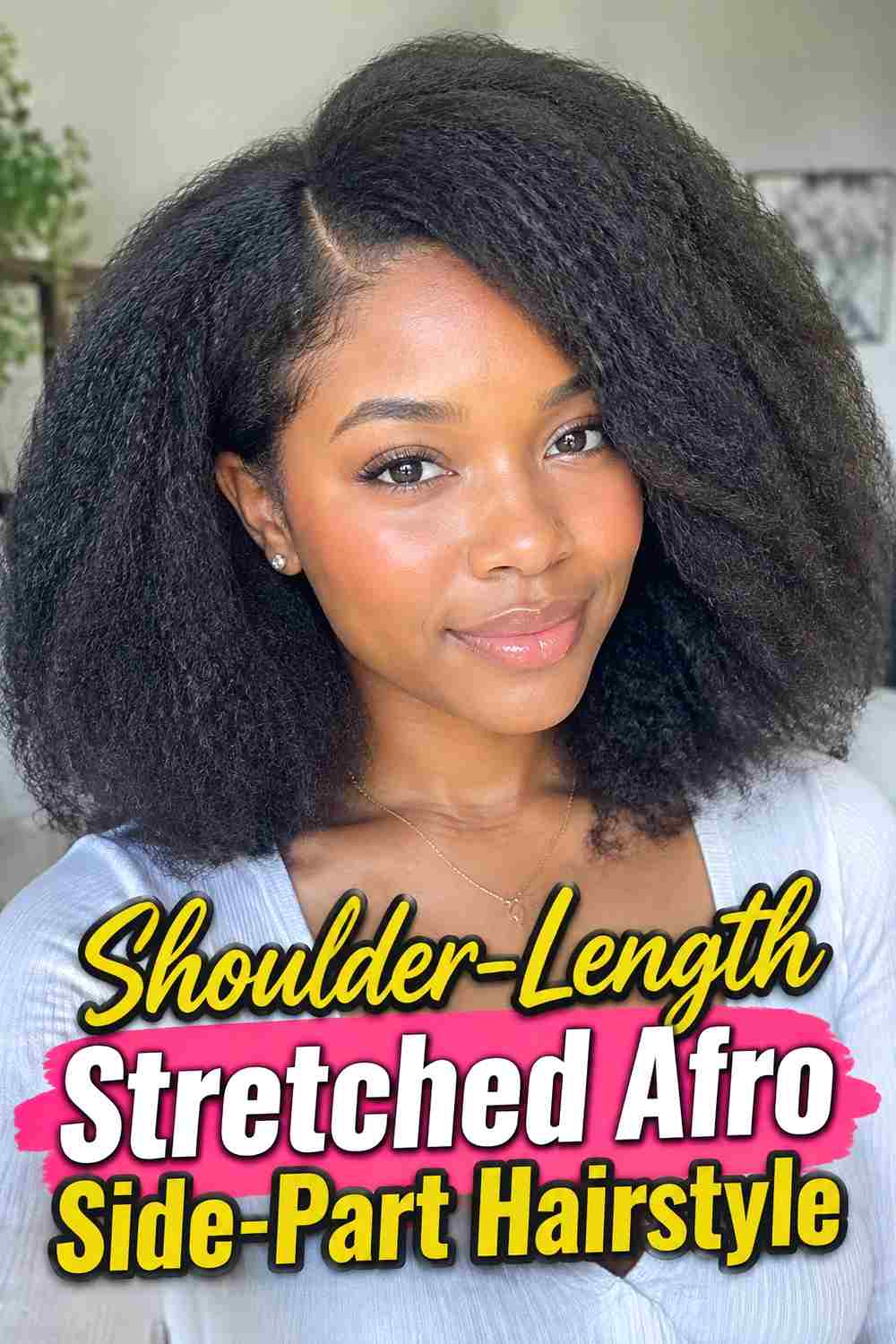 12. Shoulder Length Stretched Afro Side Part Hairstyle