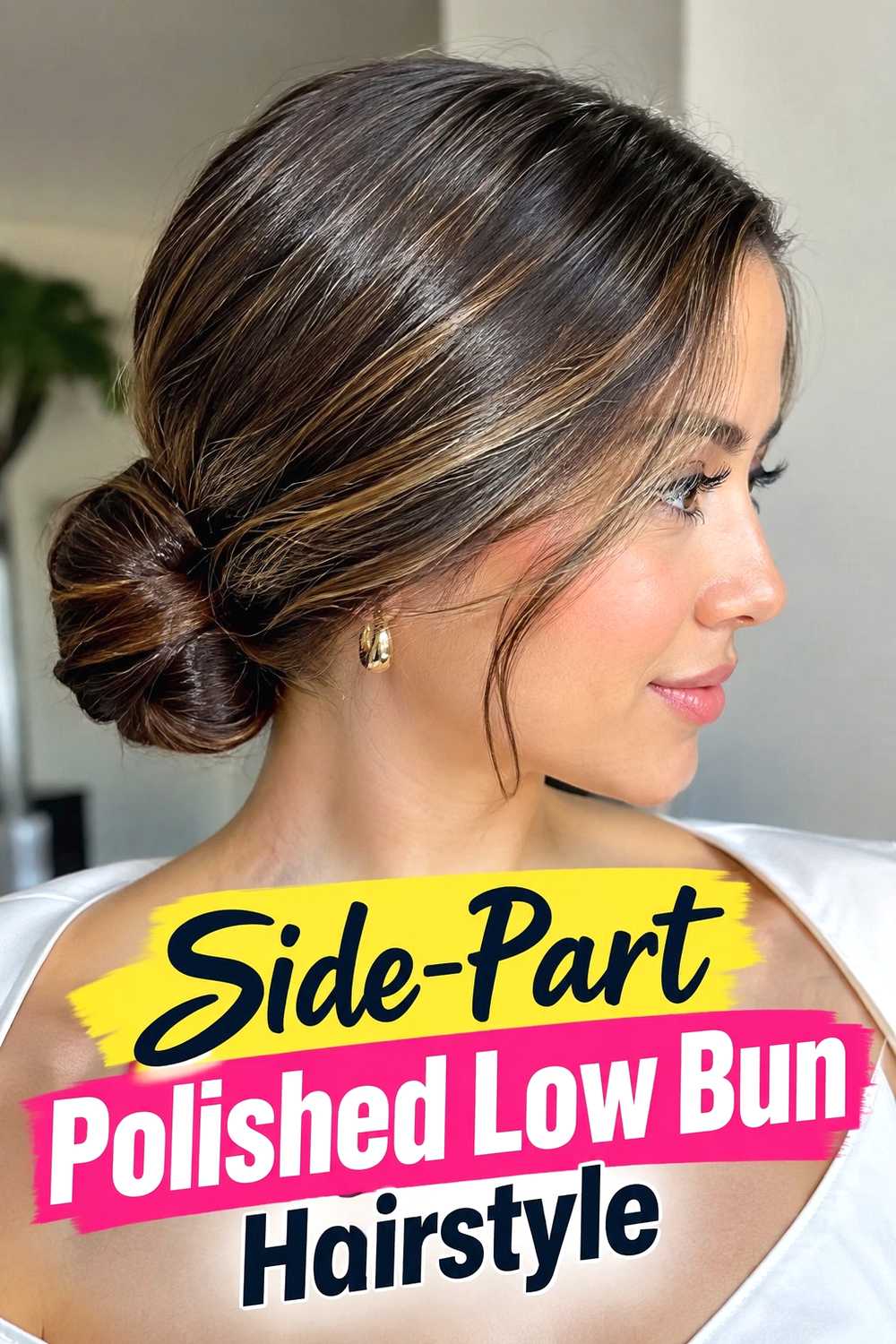 9. Side Part Polished Low Bun Hairstyle