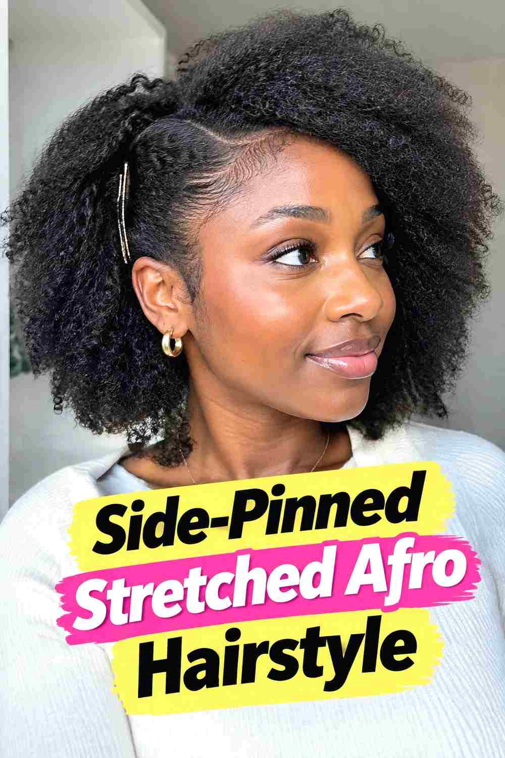 14. Side Pinned Stretched Afro Hairstyle