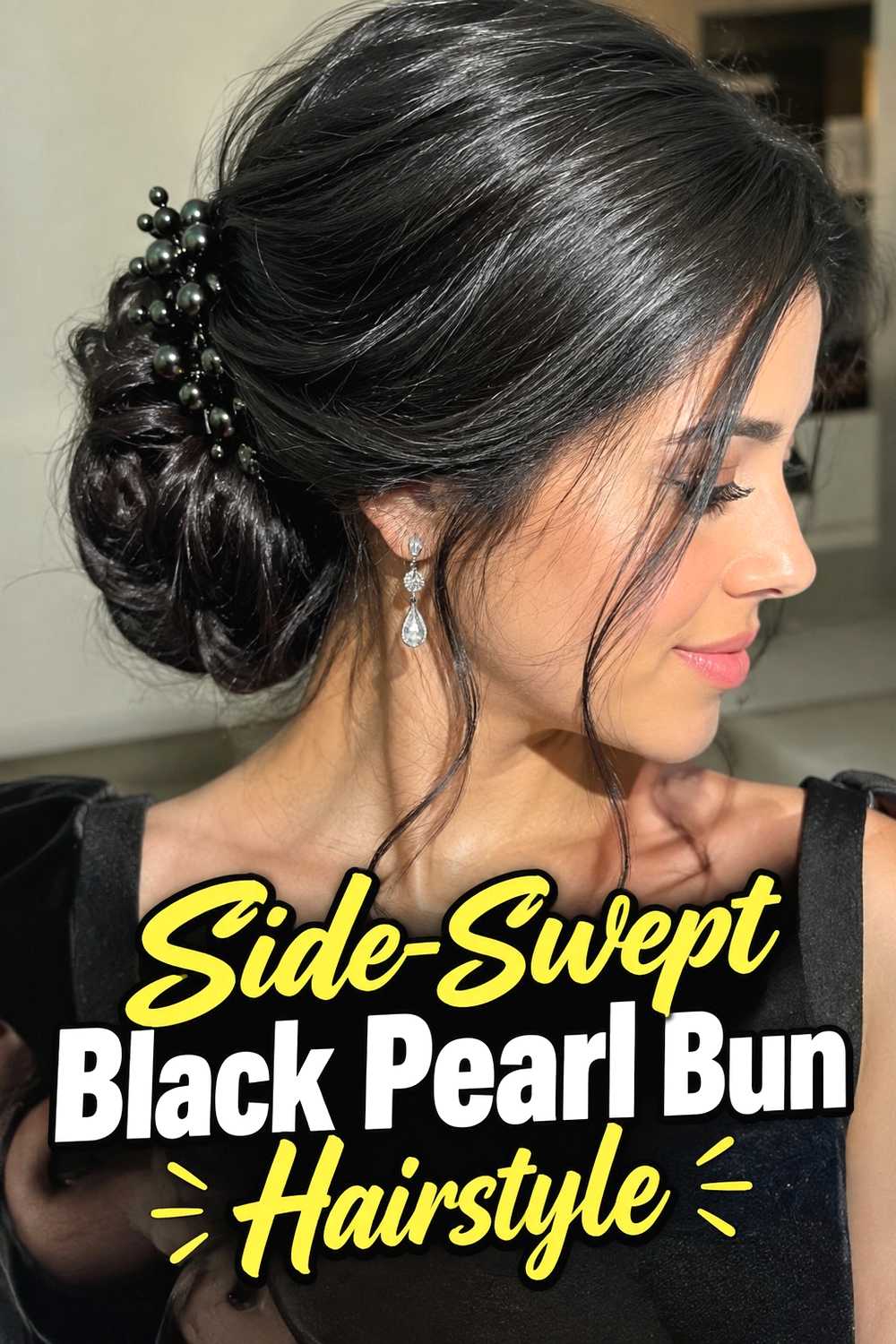 8. Side Swept Black Pearl Bun Hairstyle